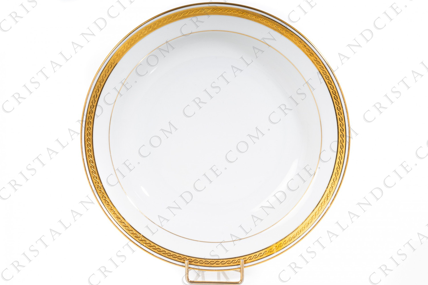 Assiette creuse en porcelaine de Limoges de la maison Bernardaud ornées d une frise en incrustations or et de filets or photo-1