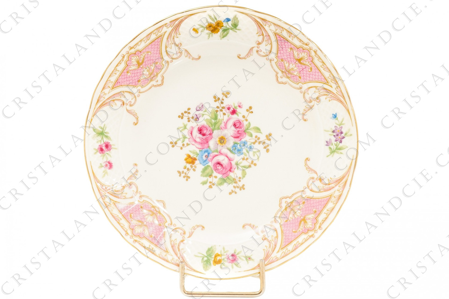 Bread and butter plate in Limoges china by Bernardaud decorated with polychrome and hand painted gold bouquets of flowers, and with pink foliages photo-1
