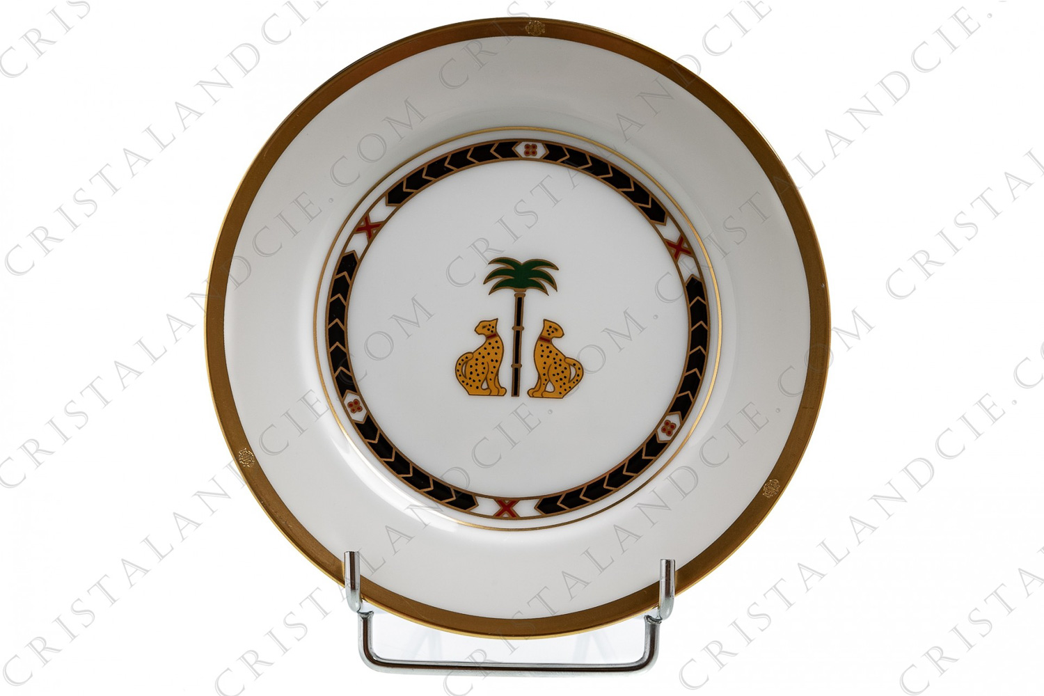 Bread and butter plate in china by Christian Dior pattern Casablanca decorated with a couple of leopards and a palm tree in the middle and with gold borders photo-1
