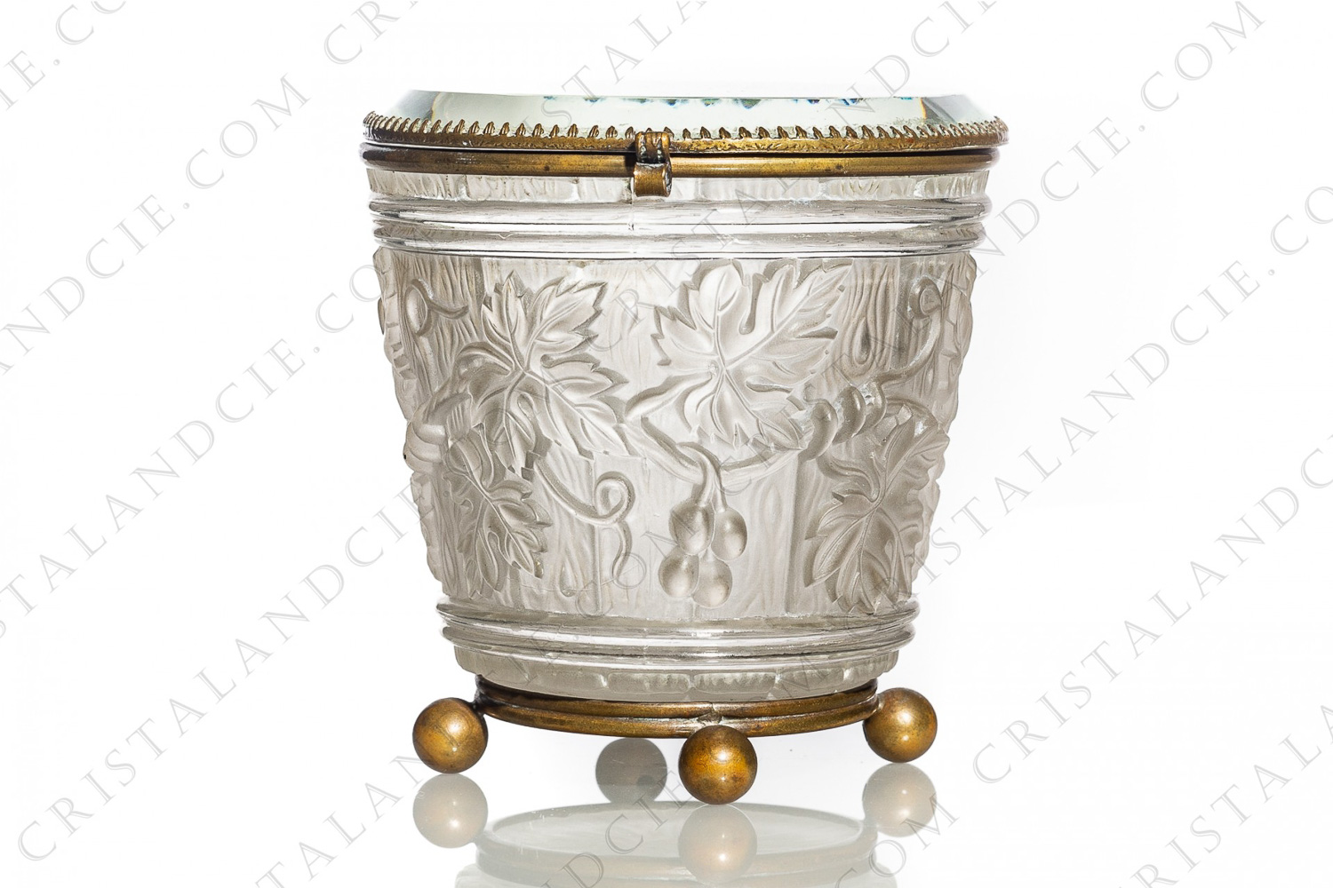 Box in molded, satin and polished crystal by Baccarat decorated with grapevine on a background seems like a barrel photo-1