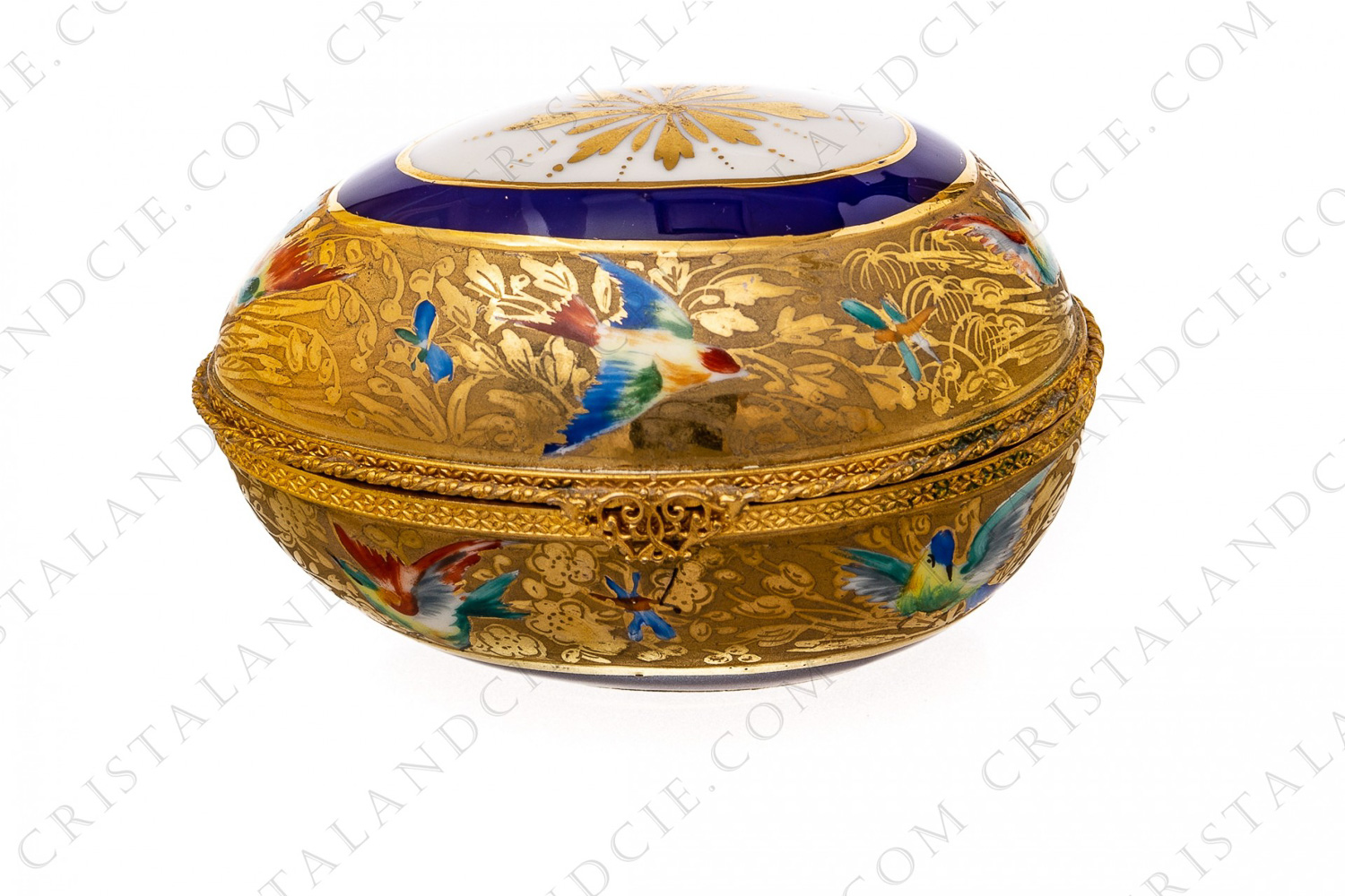 Box in the form of an egg in china hand painted by the workshops Le Tallec, decorated with polychromes enameled birds of paradise and butterflies on a gold flowered stripe photo-1