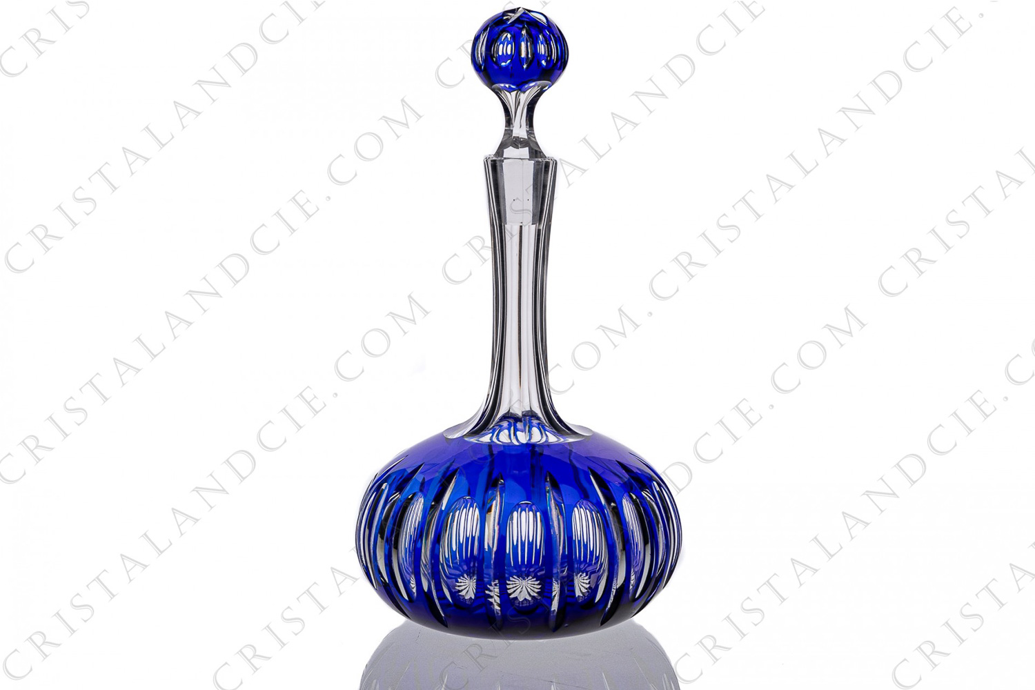 Decanter in blue double layer crystal by Saint-Louis with a cut pattern of bevels and ovales on the belly and the plug, the neck is decorated with flatcuts photo-1