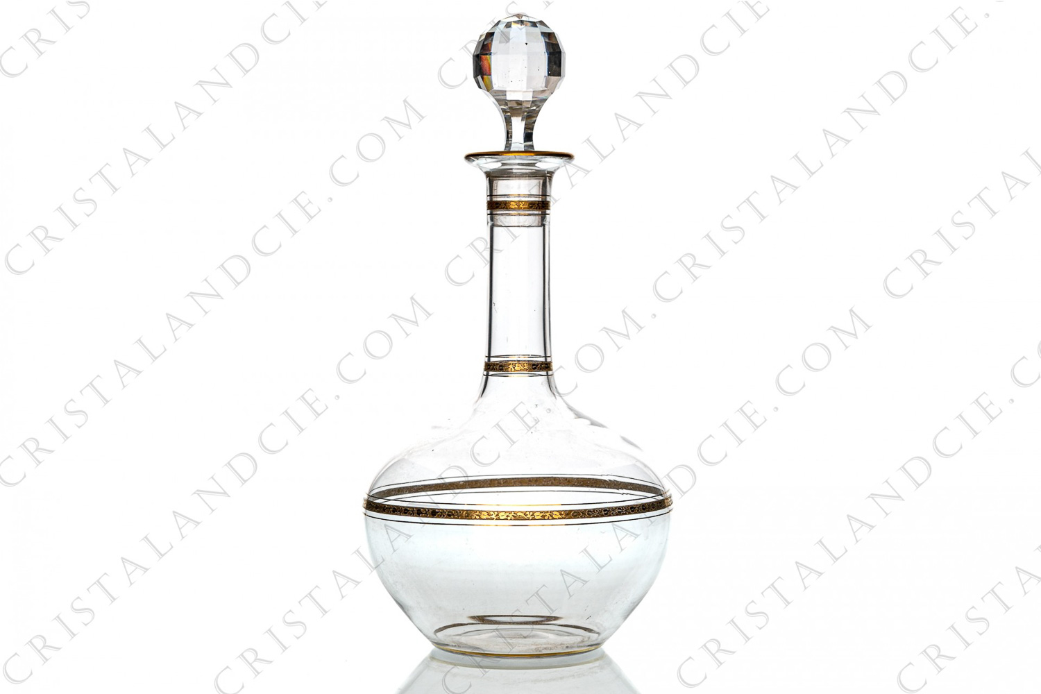 Wine decanter in crystal by Baccarat shape egg decorated with gold border, with friezes of Virginia creeper in gold inlays and with a gold star on the plug photo-1