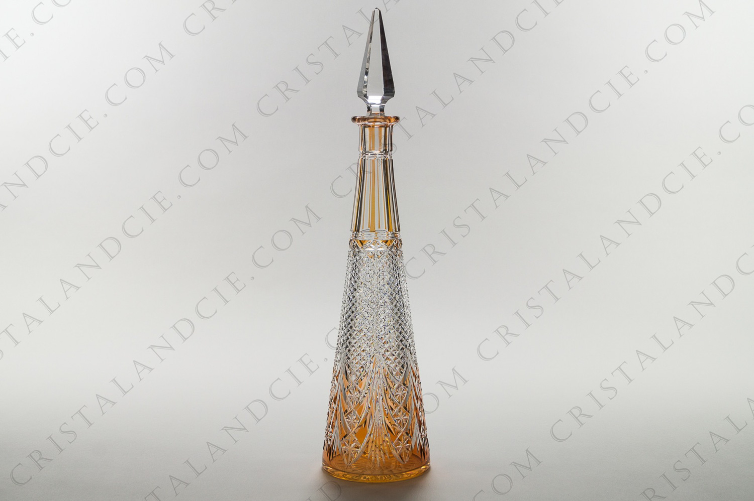 Decanter in orange double-layered crystal by Baccarat with an important carved decor photo-1