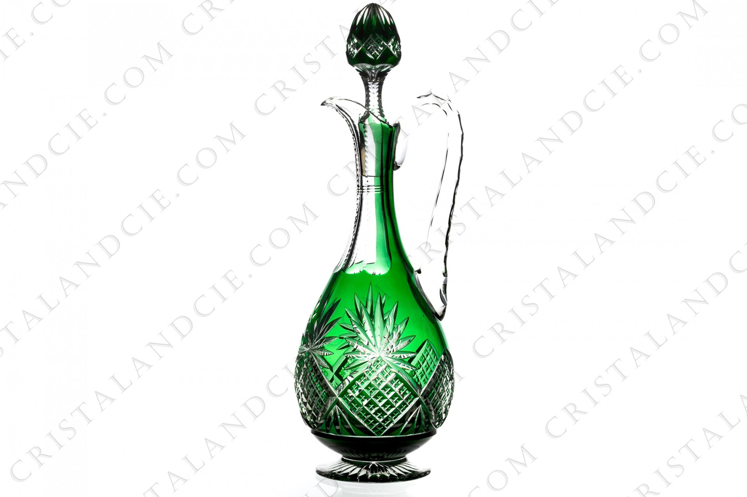 Decanter in green double layer crystal by Saint-Louis with an important cut pattern photo-1