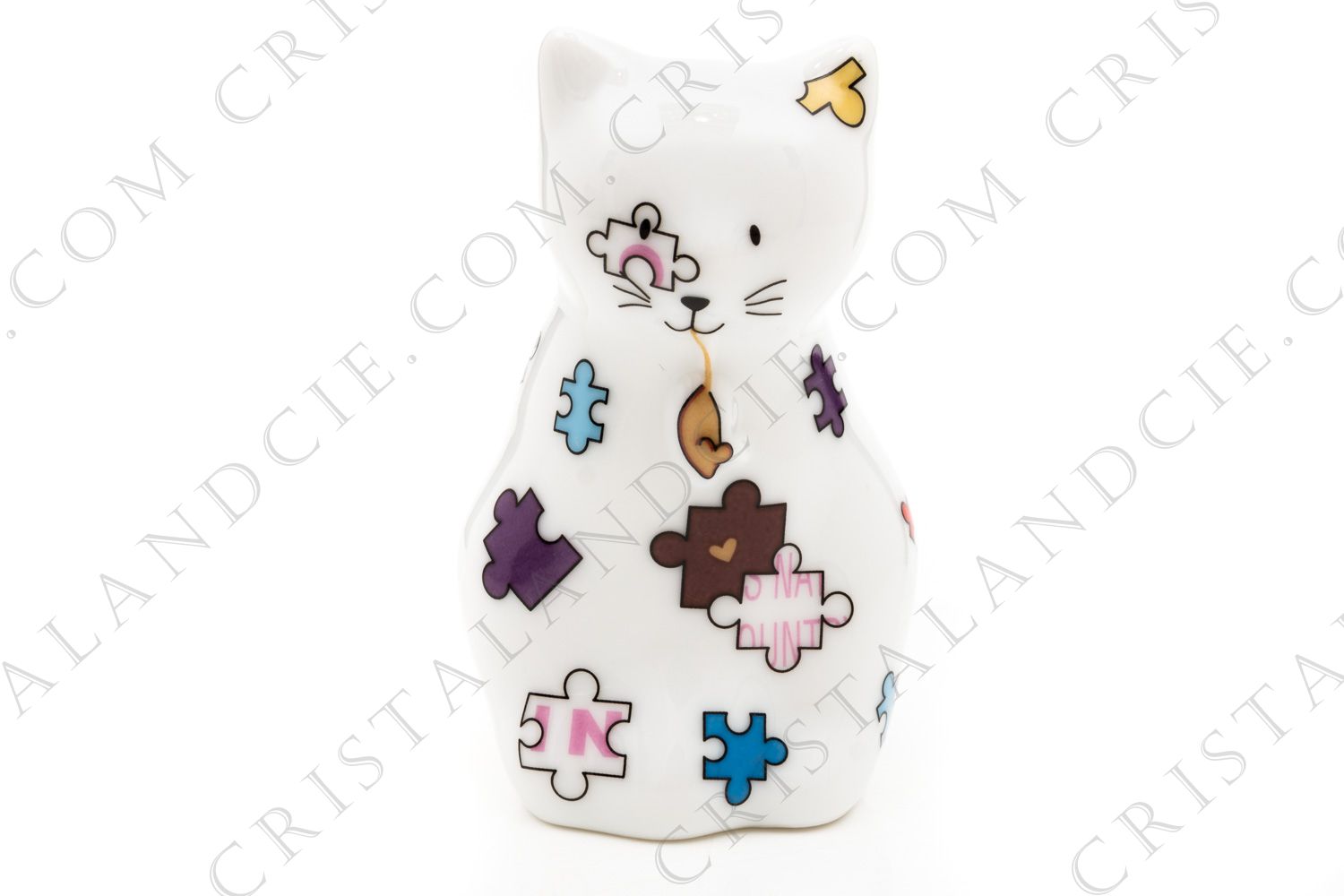 Figurine en porcelaine de Limoges de la maison Bernardaud présentant un chat décoré de pièces de puzzle polychromes photo-1