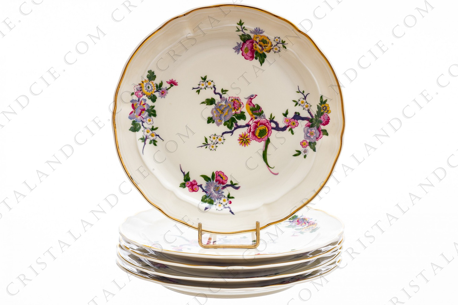 Série de cinq assiettes à dessert en porcelaine de Limoges de la maison Bernardaud modèle Bengali décorées de fleurs polychromes et d oiseaux de paradis photo-1