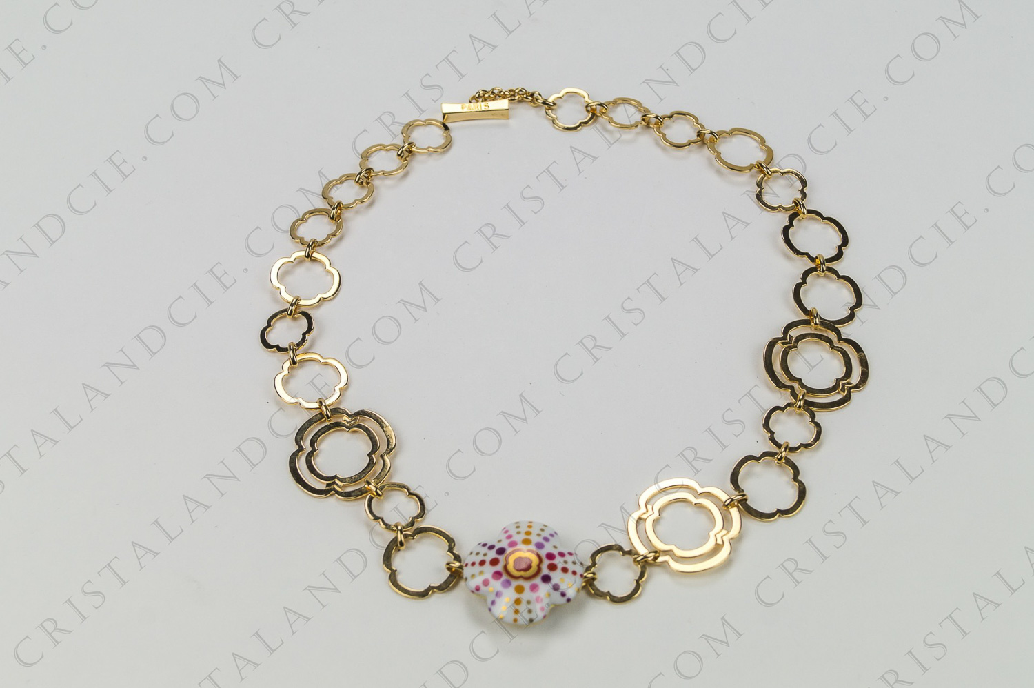 Necklace with a pendant in Limoges china by Bernardaud  with a golden metal necklace photo-1