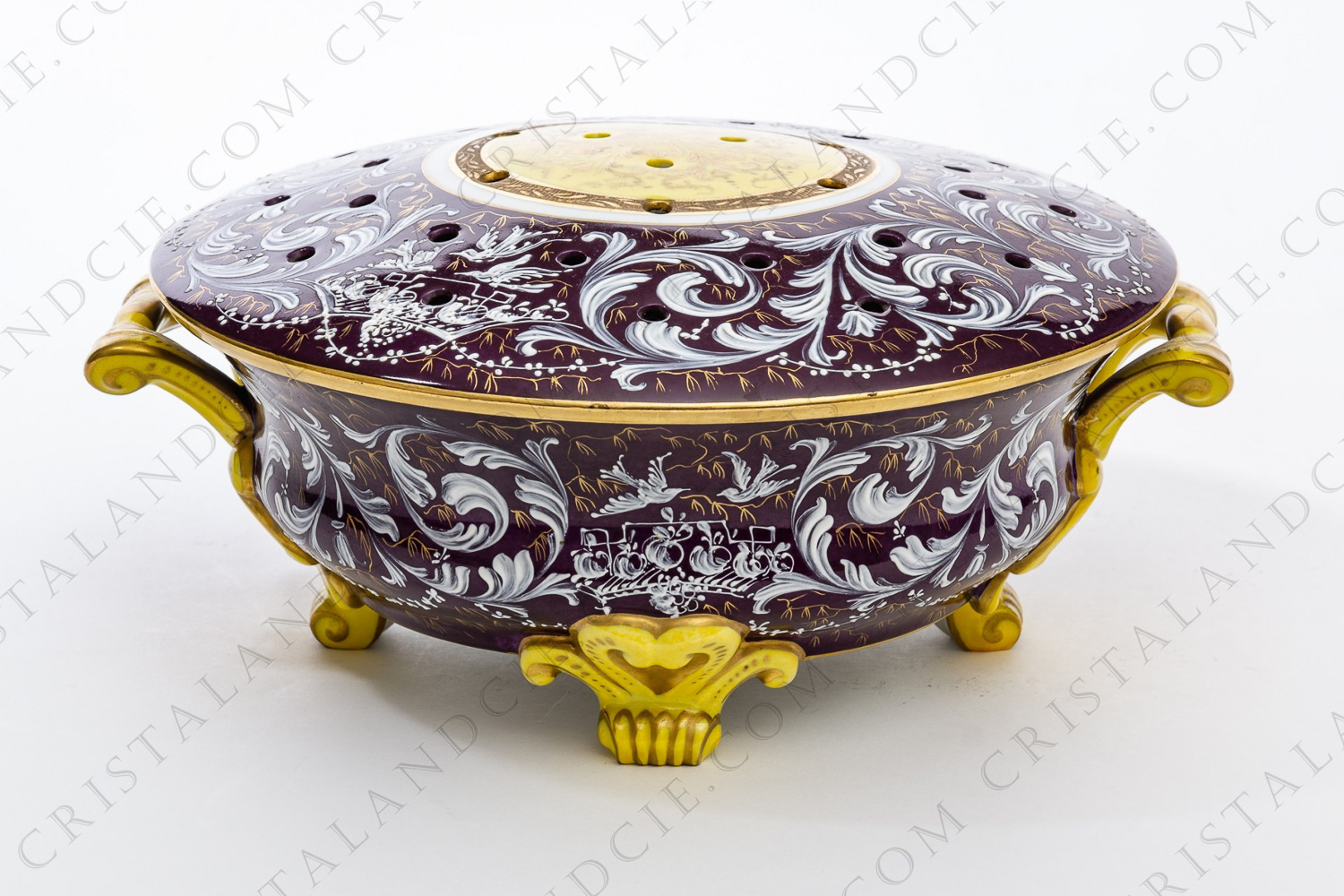 Covered bowl in china of Paris hand decorated by the workshop Le Tallec, decorated with white enameled acanthus leaves on a burgundy background, and with gold and black arabesques on a yellow and burgundy background photo-1