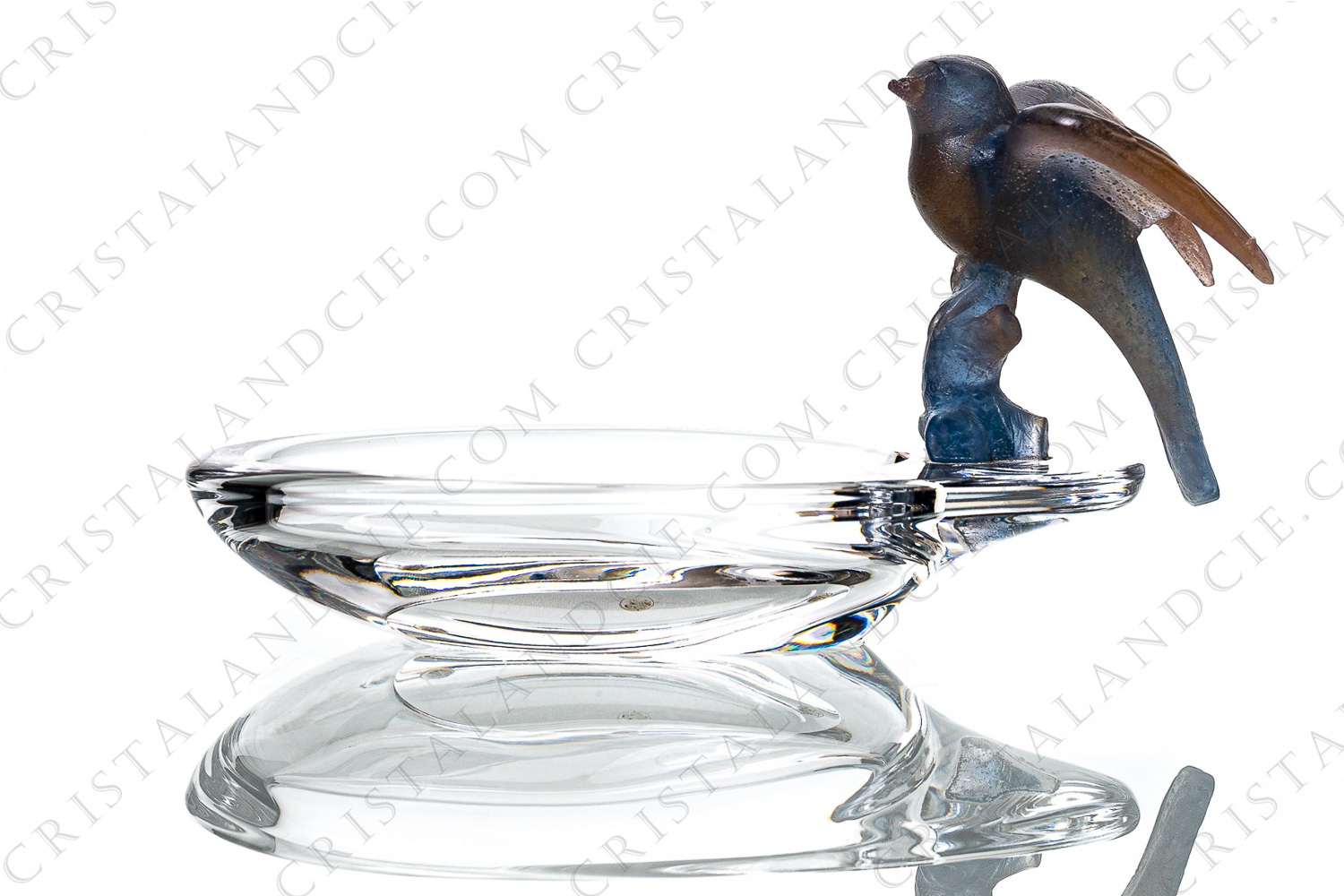 Small bowl in crystal and pate de verre by Daum pattern Hightingale, with a bowl in crystal and a nightingale in blue and pink pate de verre, the wings spread, perched on a branch photo-1