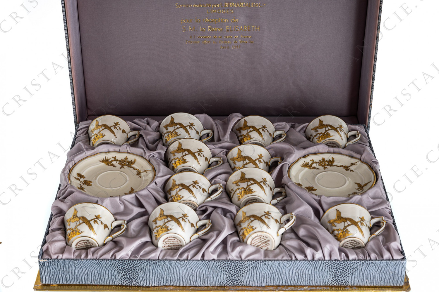 Set of twelve moka cups in china of Limoges by Bernardaud pattern Reine Elisabeth decorated with gold birds of paradise and branches photo-1
