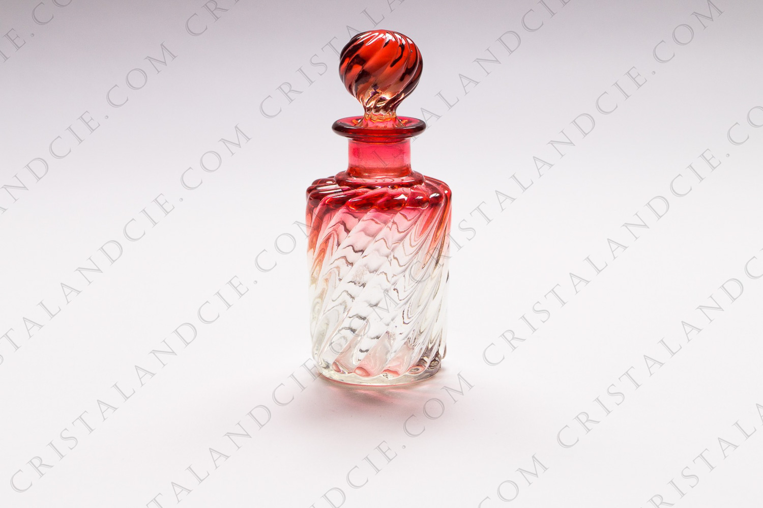 Perfume bottle in crystal by Baccarat pattern pinkish Swirl Bambous photo-1