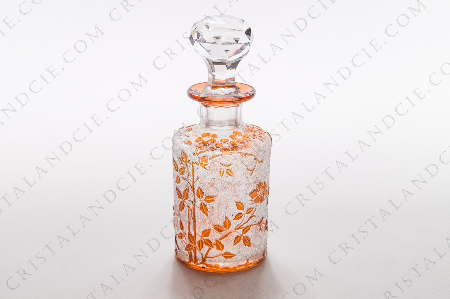 Perfume bottle in double layered crystal by Baccarat pattern Eglantier orange, decorated with briar on an incised background photo-1