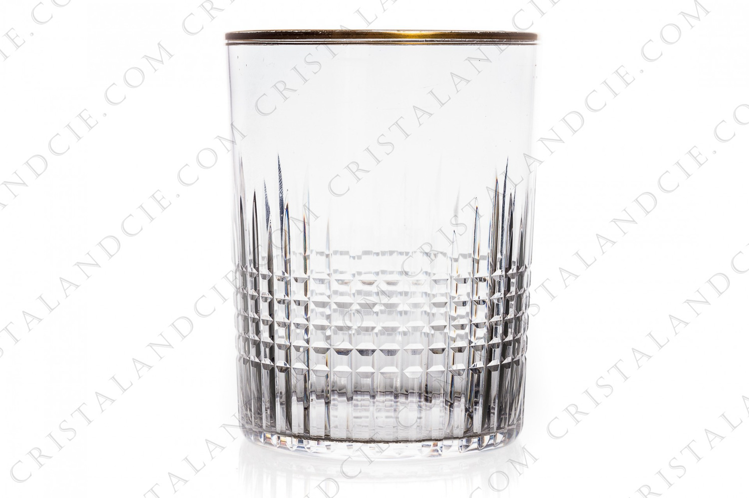 Tumbler in crystal by Baccarat pattern Nancy gold with an important cut pattern and a gold border photo-1