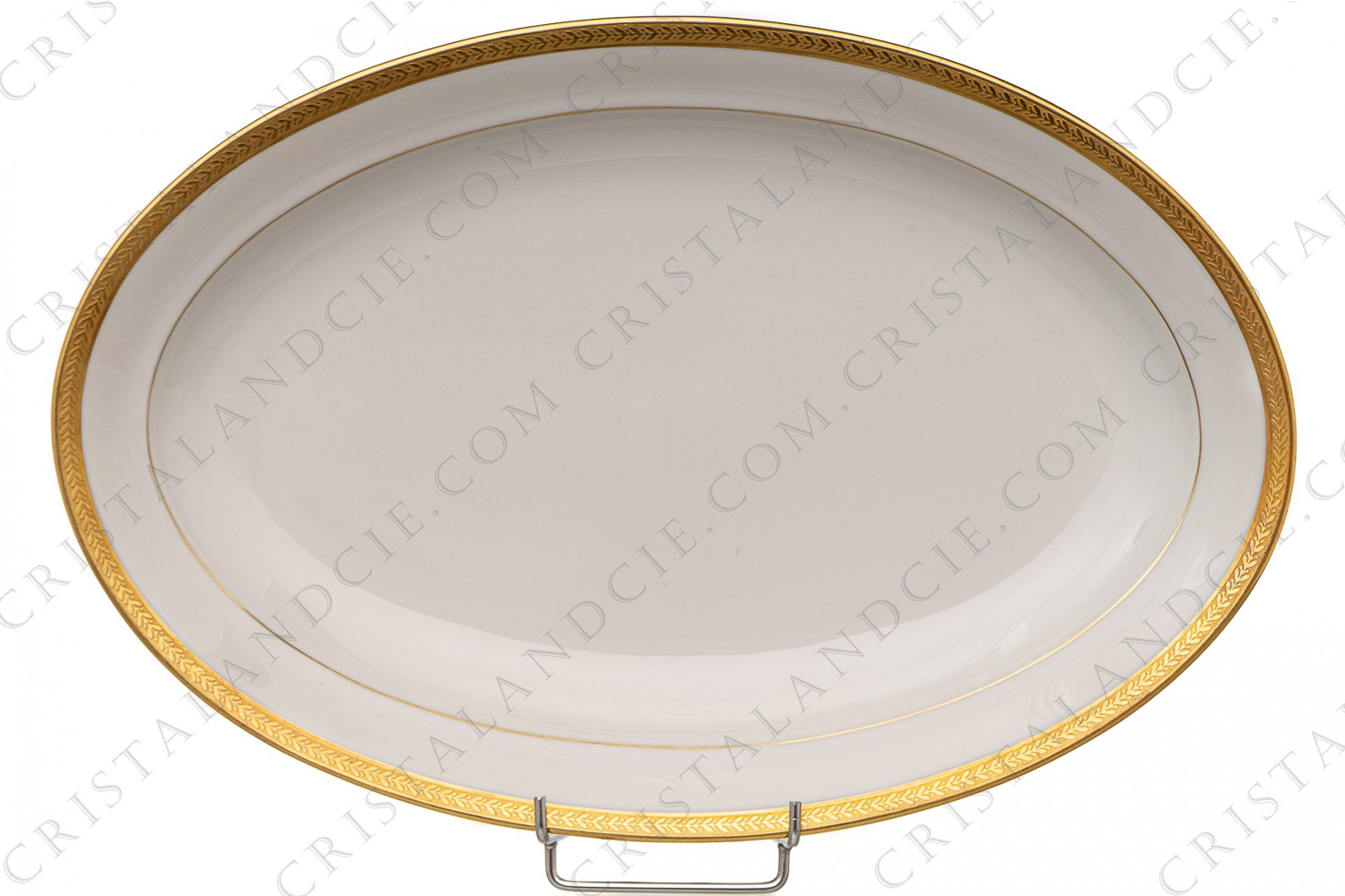 Grand plat ovale en porcelaine de Limoges de la maison Chastanier orné d une frises de lauriers en incrustations or photo-1