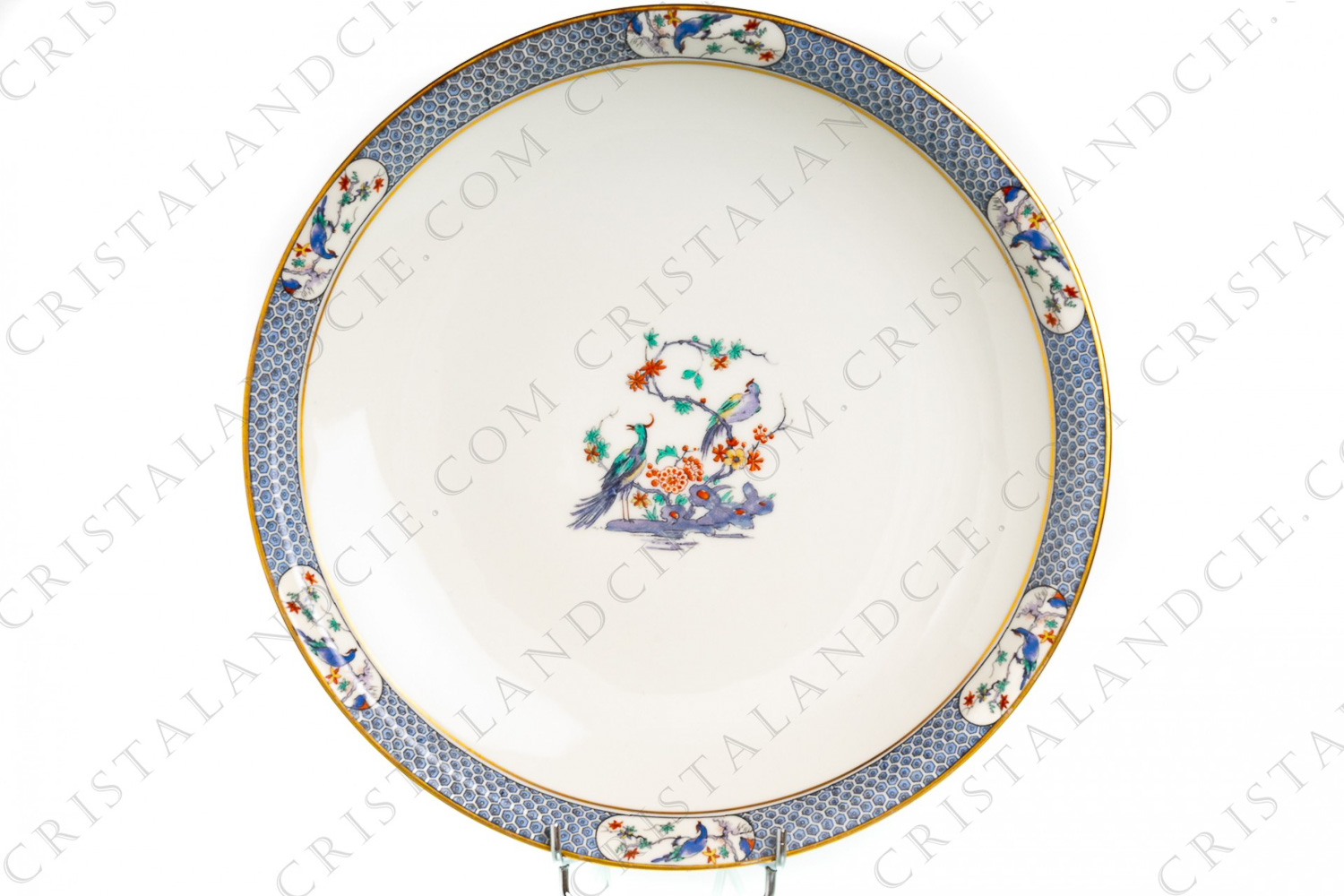 Large round dish in Limoges china by Theodore Haviland pattern Ambazar, decorated with birds of paradise on branches and with gold borders photo-1