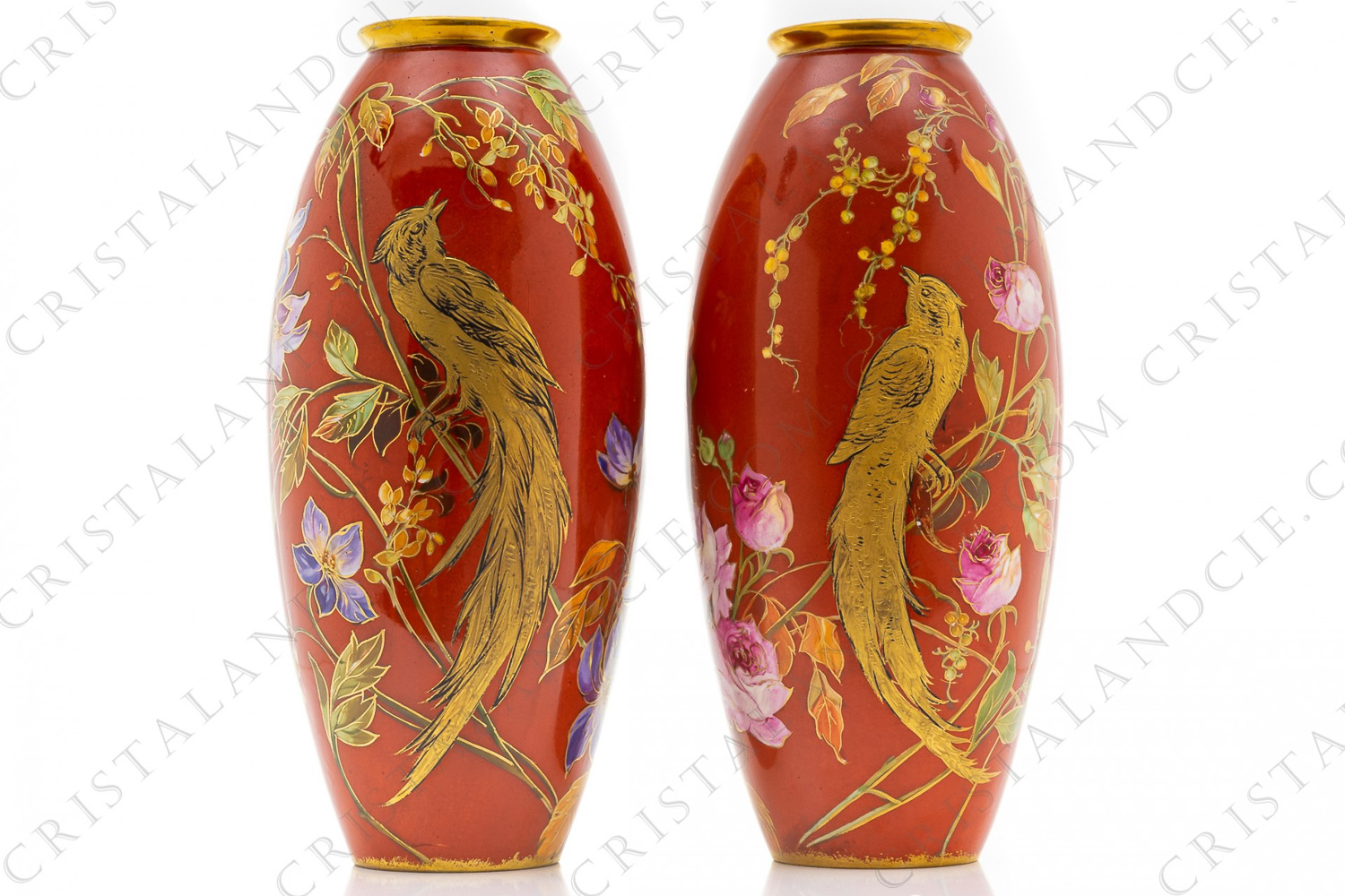 Pair of vases in Limoges china by Bernardaud with a hand painted pattern of a gold in relief couple of birds of paradise on polychromes flowered foliages on an orange background photo-1