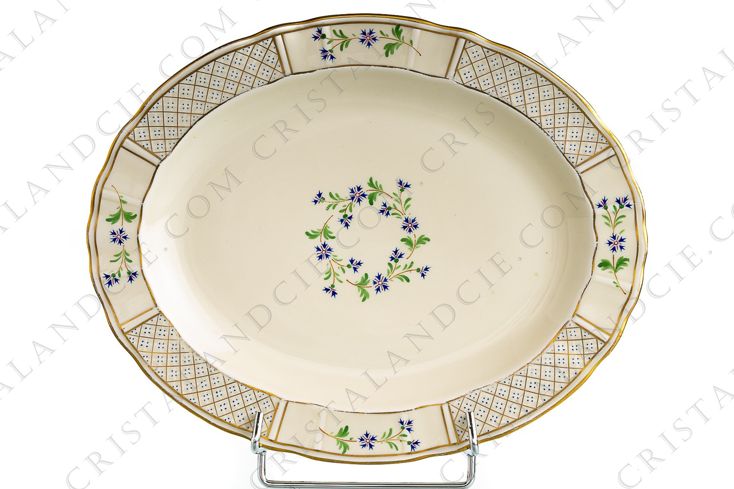 Petit plat ovale en porcelaine de Limoges de la maison Bernardaud orné de barbeaux et filets or photo-1