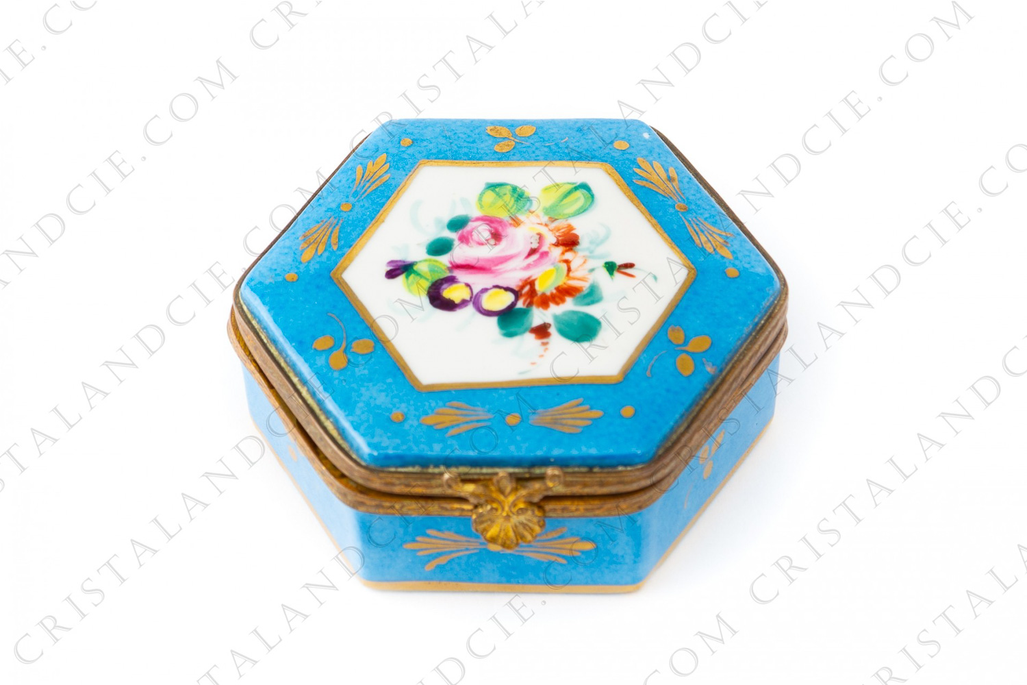 Small box in china hand painted by the workshop Le Tallec decorated with gold and polychromes flowers on a blue background photo-1