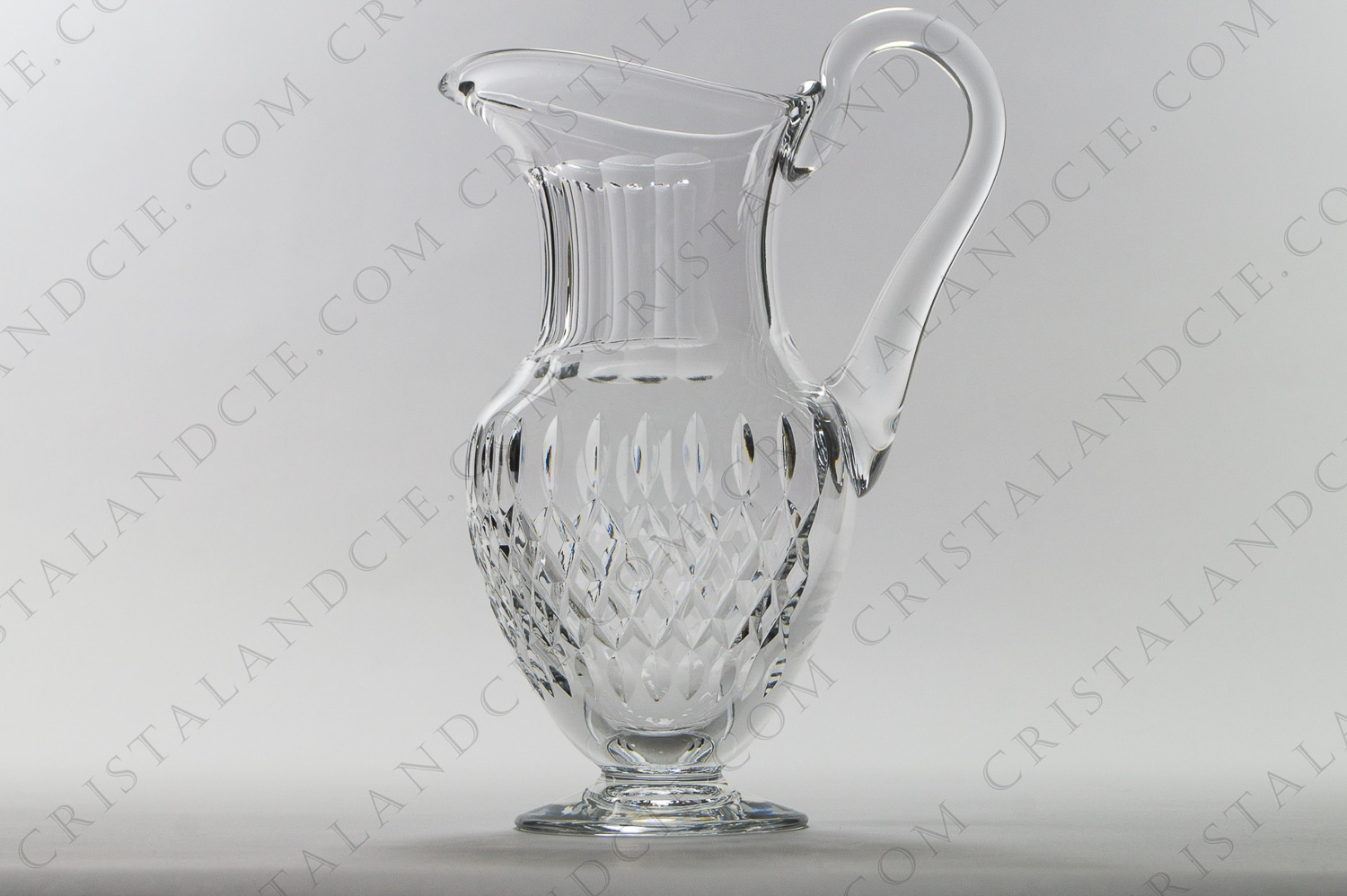 Water jug in crystal by Saint-Louis pattern Messine with an important carved decor photo-1