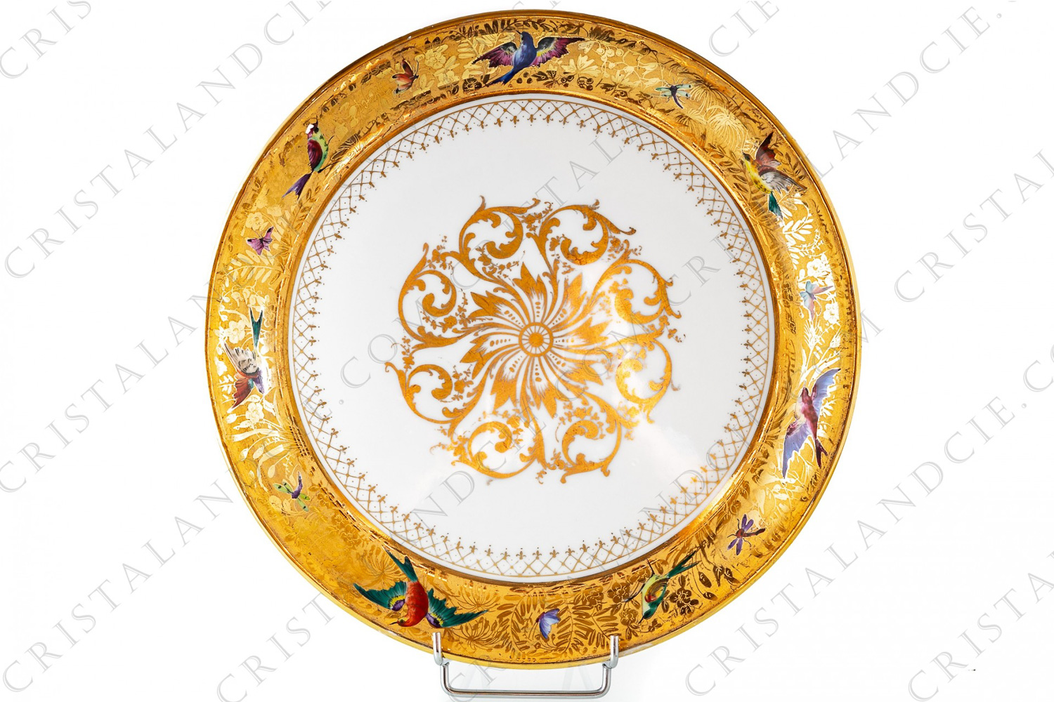 Cake dish in china hand painted by the workshops Le Tallec, decorated with polychromes enameled birds of paradise and butterflies on a gold flowered stripe photo-1