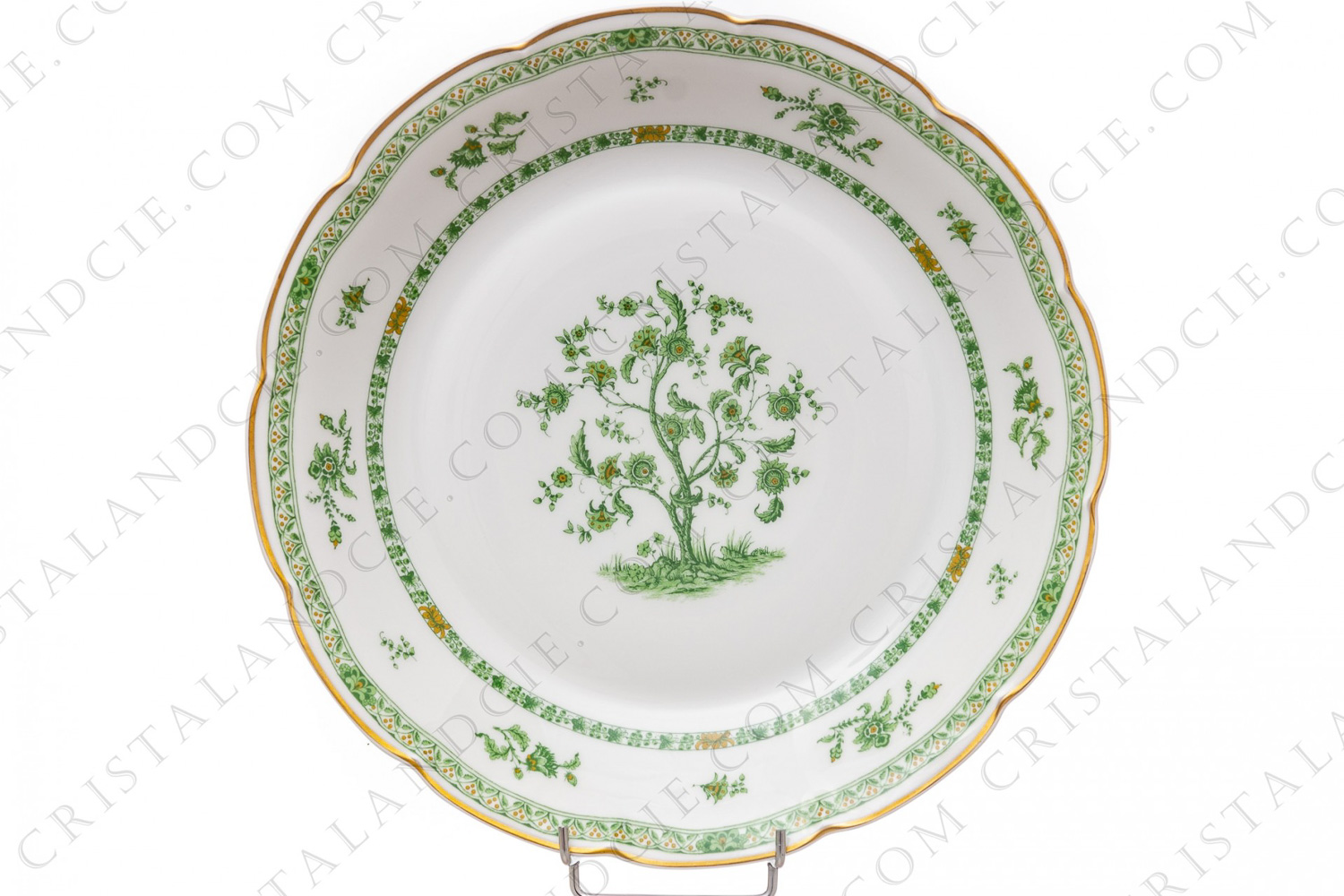 Plat rond creux en porcelaine de Limoges de la maison Haviland modèle Arbre vert forme Lutèce orné d un arbre fleuri vert et brun en son centre, de frises végétales et d un liseré or photo-1