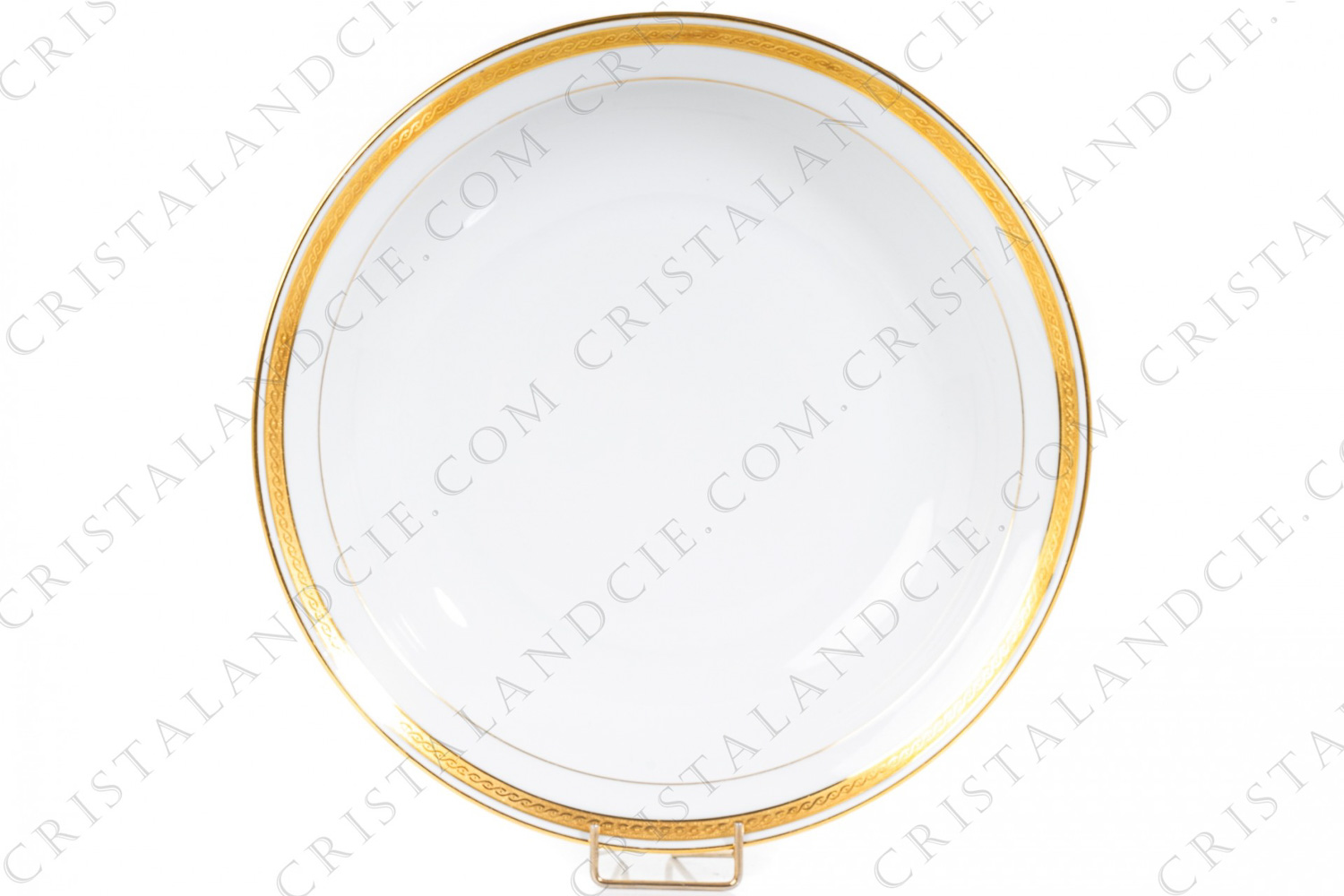 Round deep dish in Limoges china by Bernardaud decorated with a frieze in gold inlays and gold borders photo-1