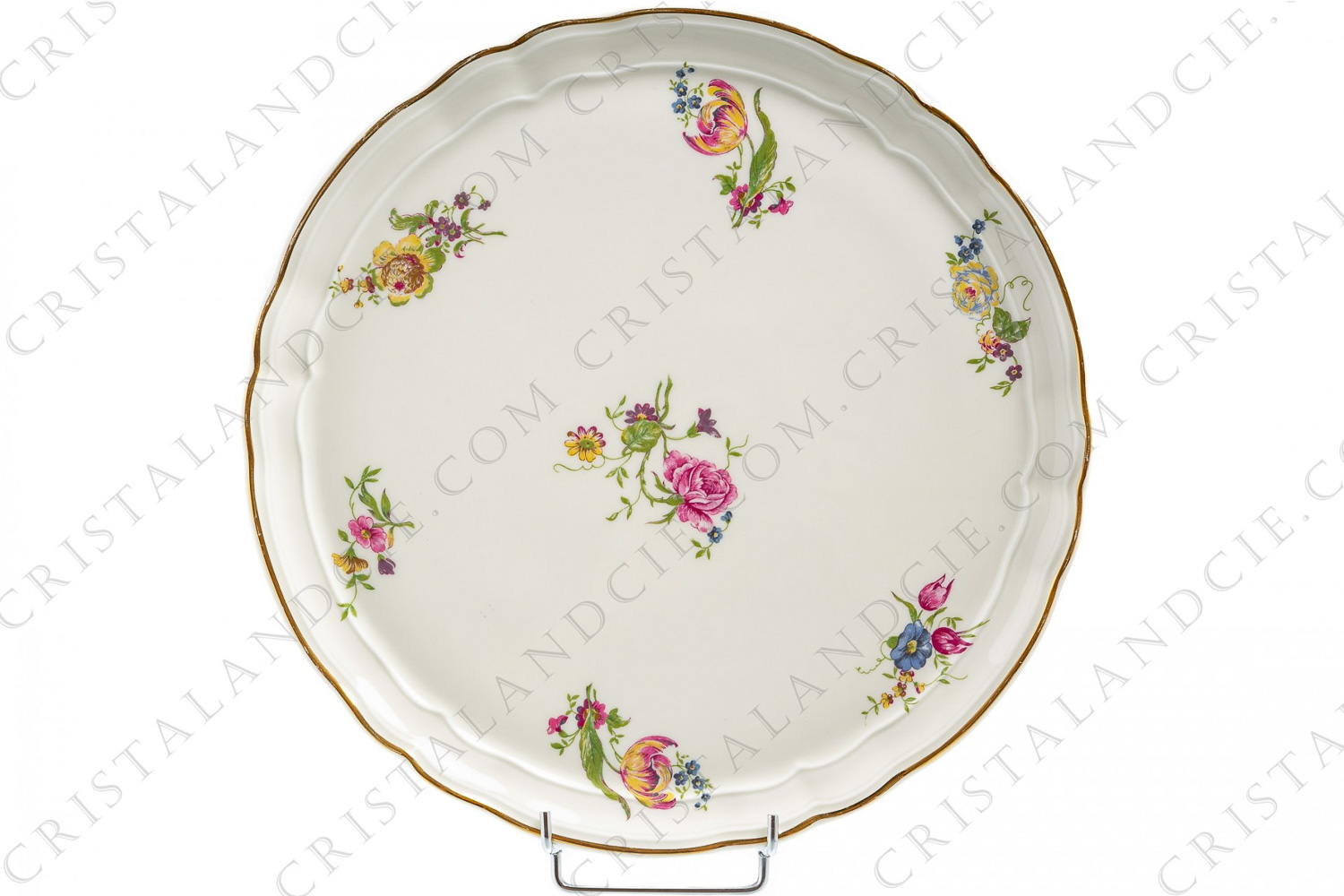 Plat à tarte en porcelaine de Limoges de la maison Bernardaud forme Régence décorées de fleurs polychromes photo-1