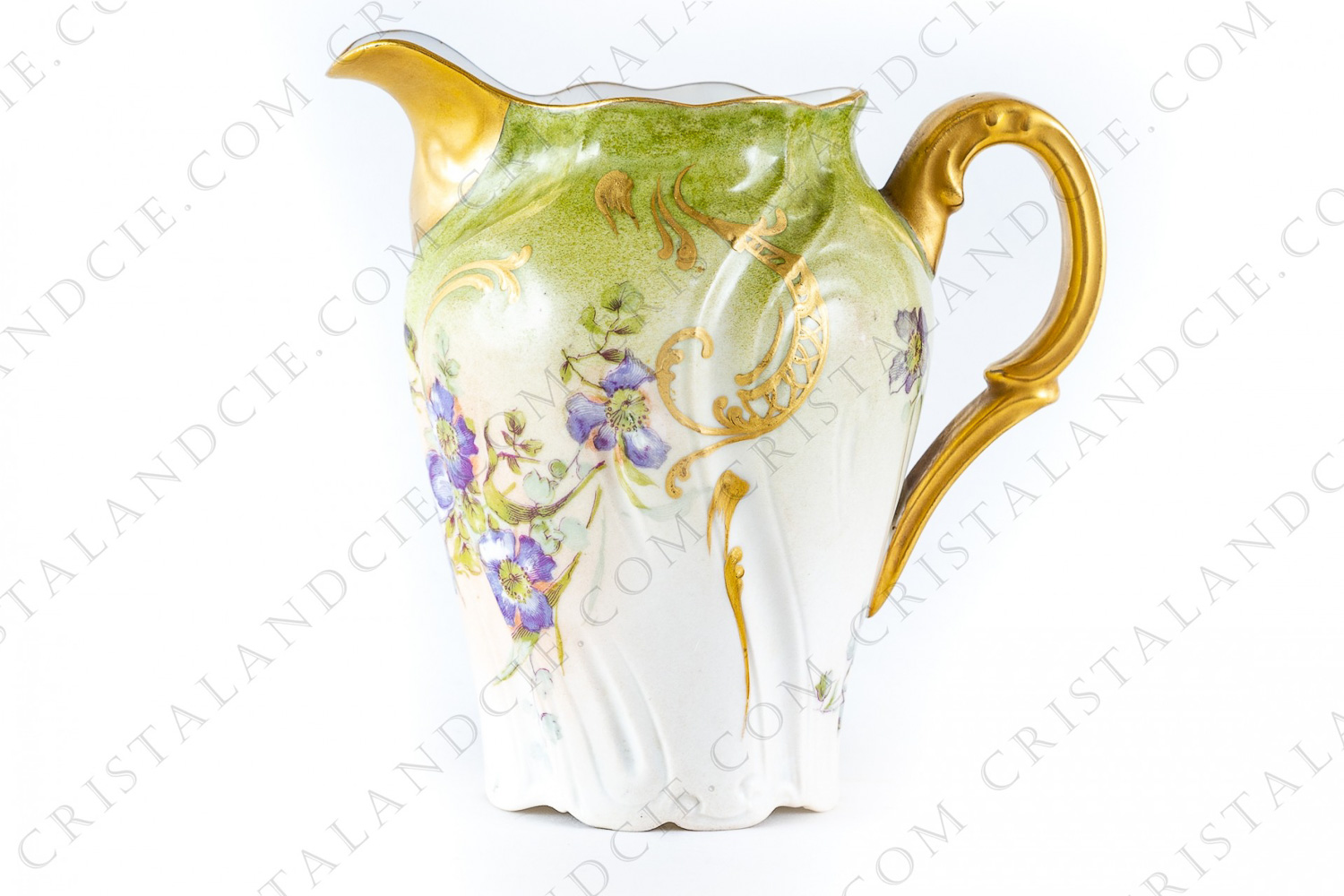 Creamer in china of Limoges with an hand painted pattern of wild roses and lilies of the valley photo-1