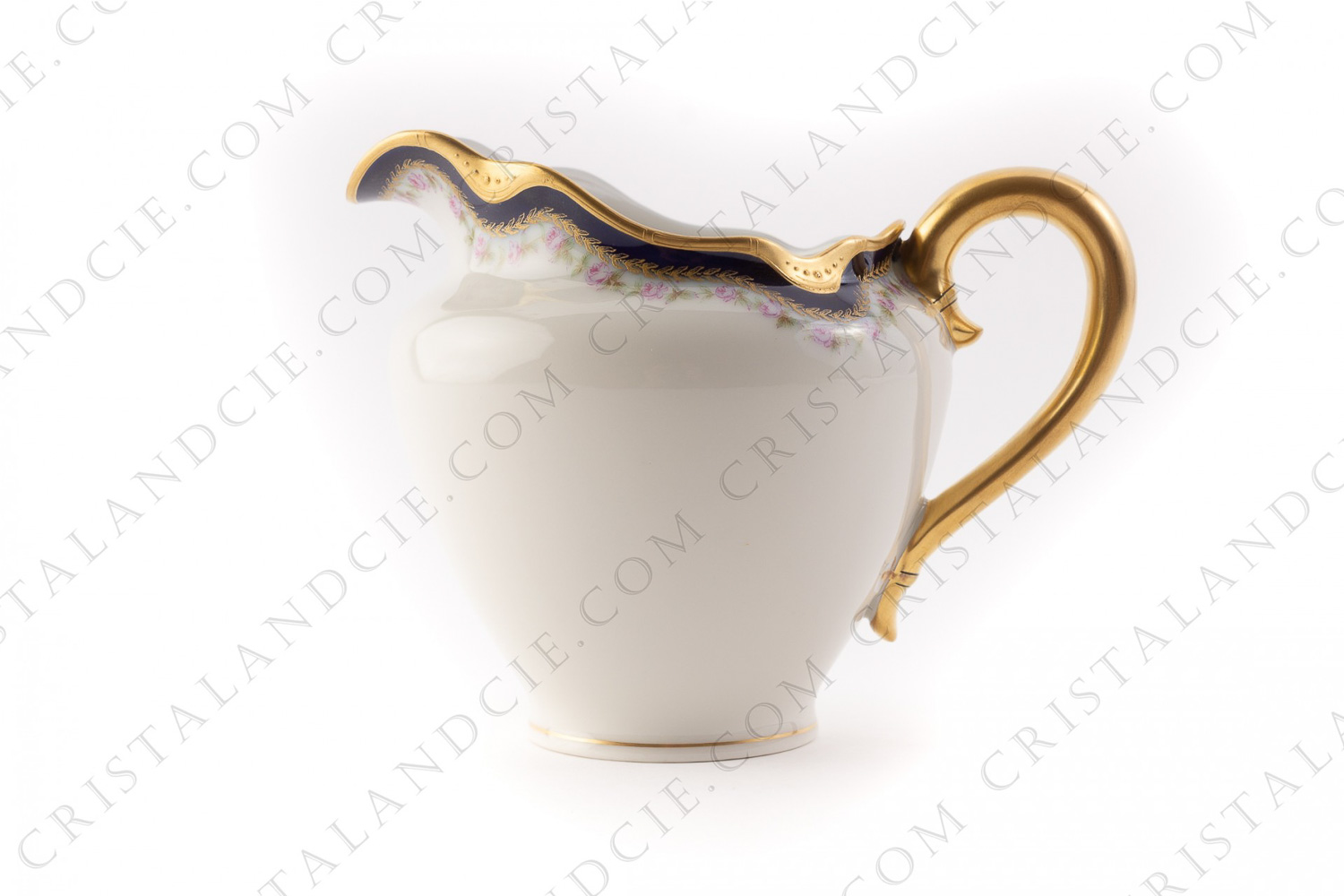 Creamer in Limoges china by Haviland decorated with hand painted blue cobalt and gold stripes, and with friezes of polychromes roses photo-1