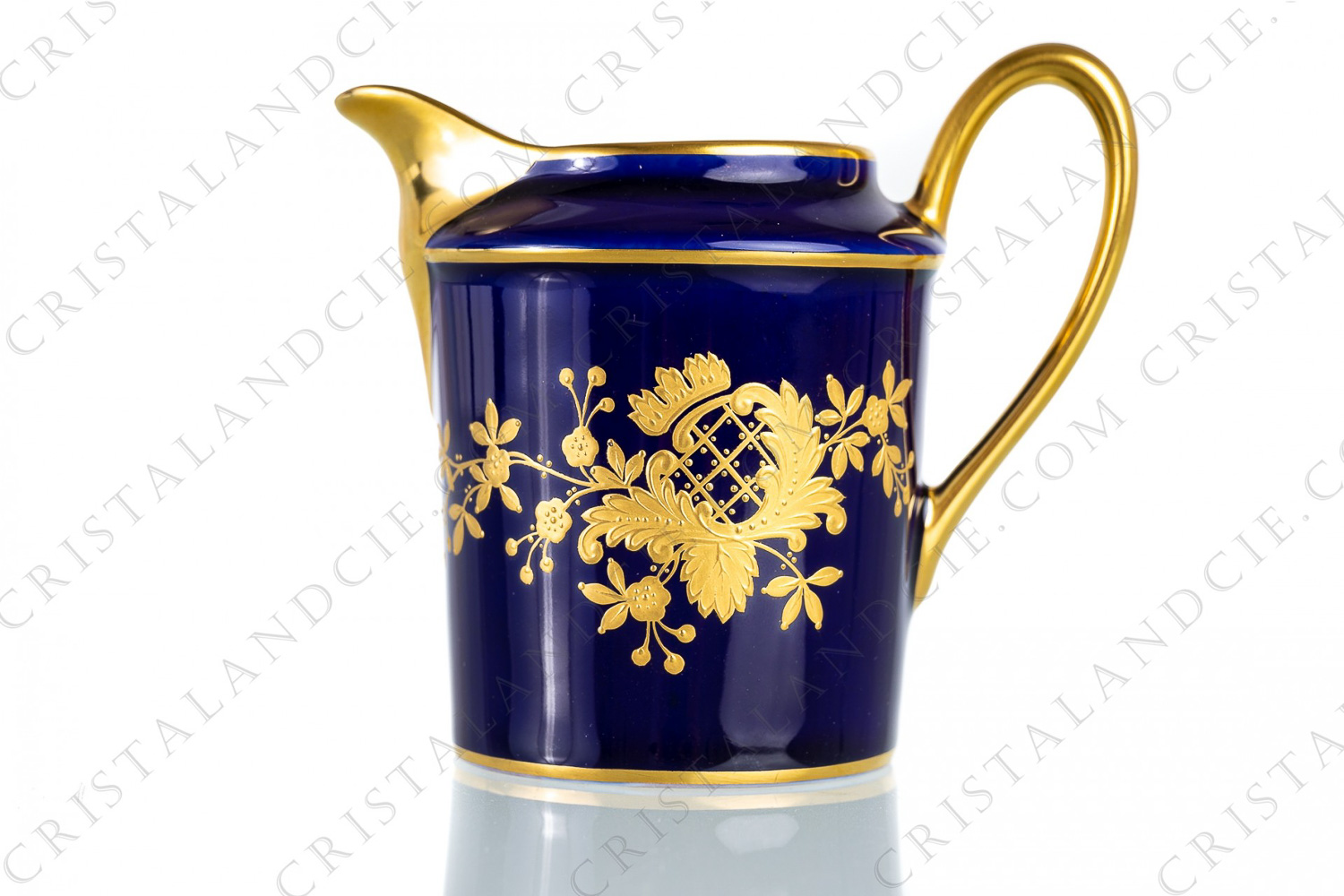 Creamer in Limoges china hand decorated by Carmona with gold flowered boughes on a cobalt blue background photo-1
