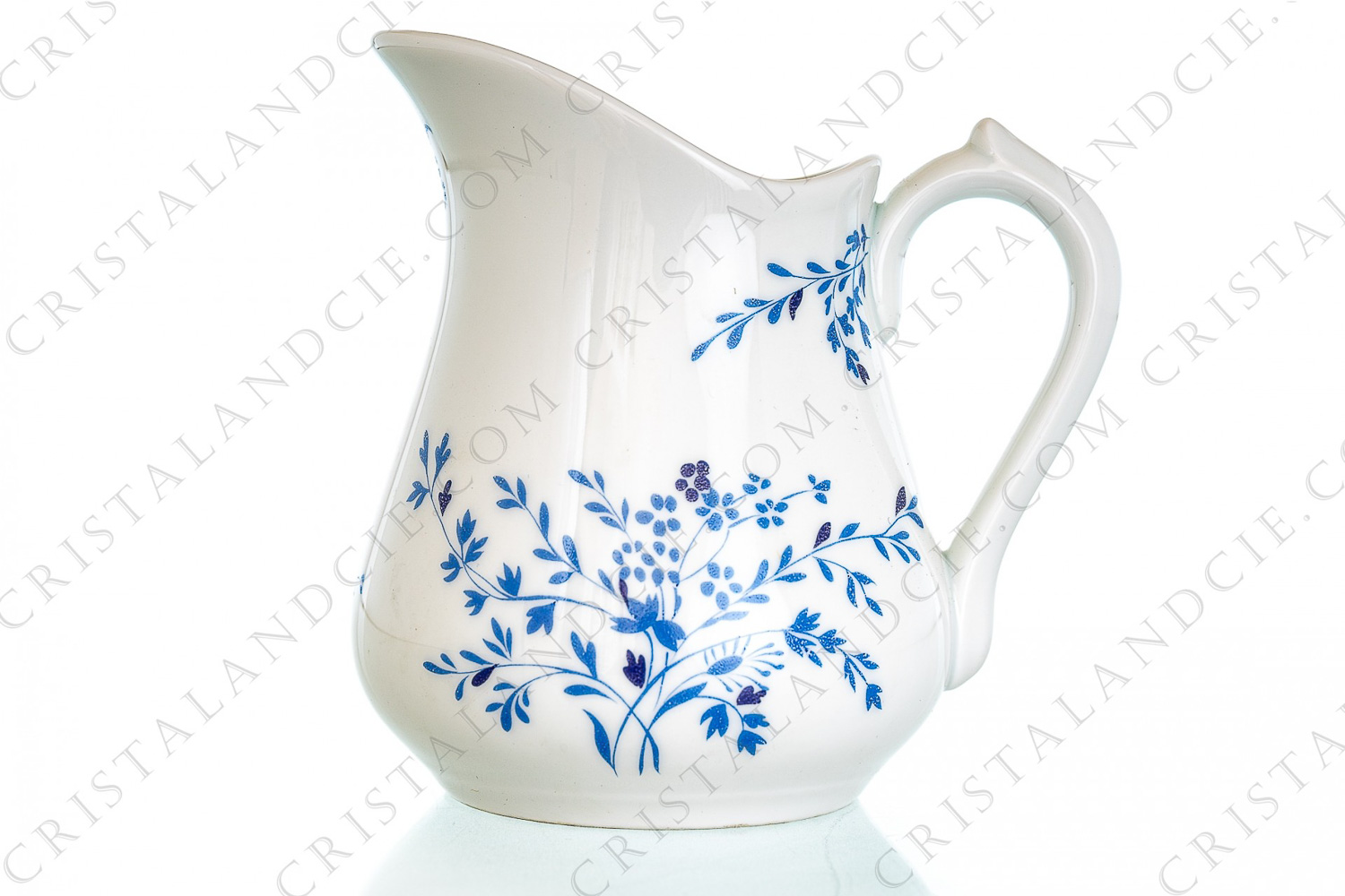 Creamer in Limoges china by L Ancienne Manufacture Royale (Bernardaud) whose the pattern of blue flowers has been created by the great society of home linens D photo-1