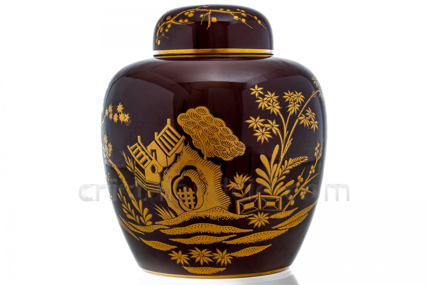 Tea jar in Limoges china by Bernardaud pattern Séoul brun decorated with a gold japanese landscape on a brown background photo-1