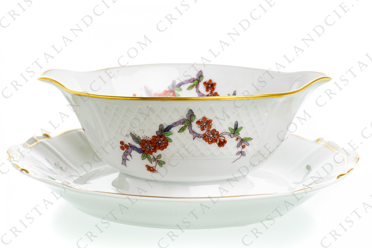 Gravy boat in Limoges china by Bernardaud pattern Condé having a copy of a japanese pattern of the Manufacture de Chantilly from the 18th century photo-1
