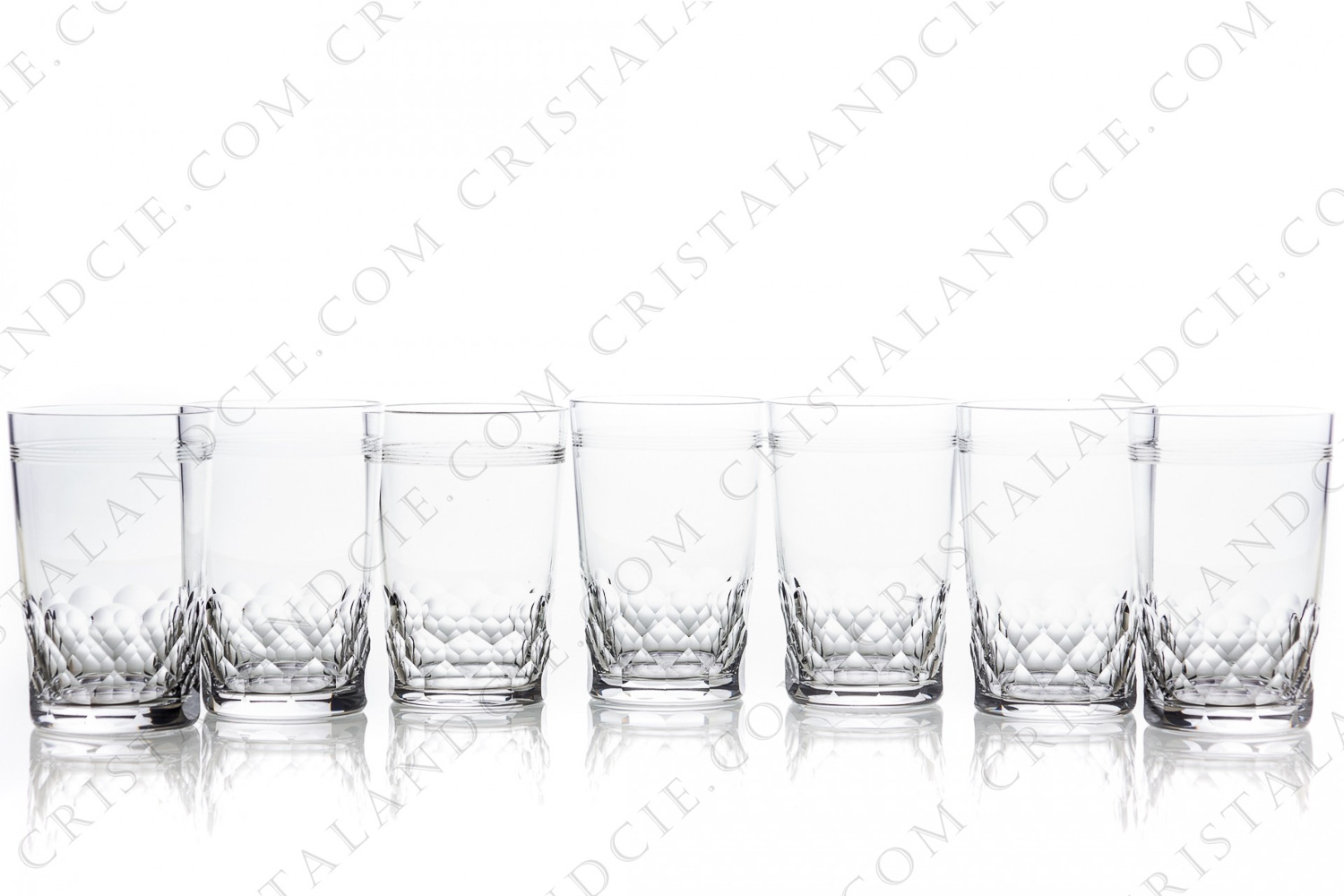 Set of sevent tumblers in crystal by Baccarat pattern Chauny with a cut pattern of scales and strips photo-1