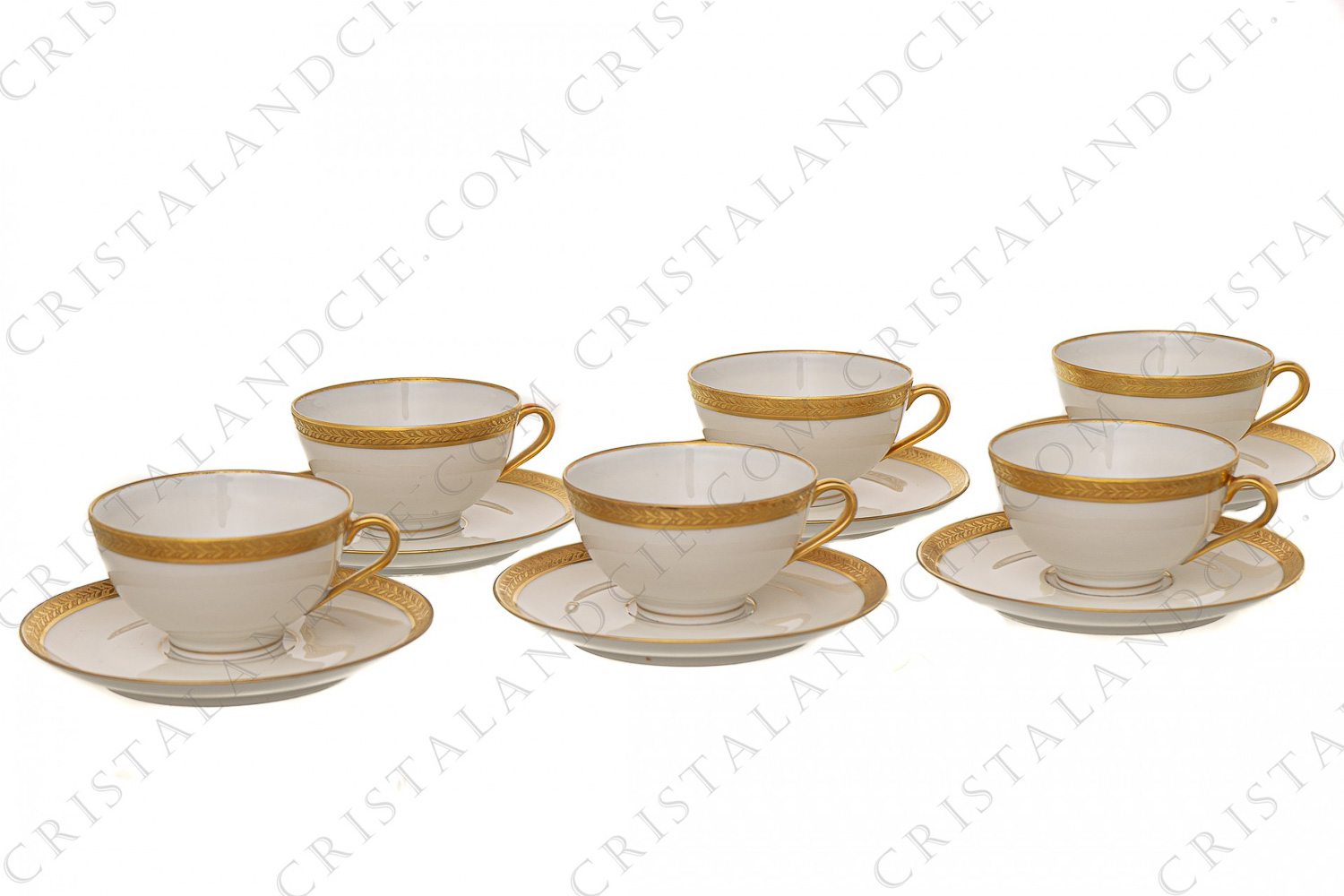 Série de six tasses à café en porcelaine de Limoges de la maison Chastagner ornées d une frises de lauriers en incrustations or photo-1