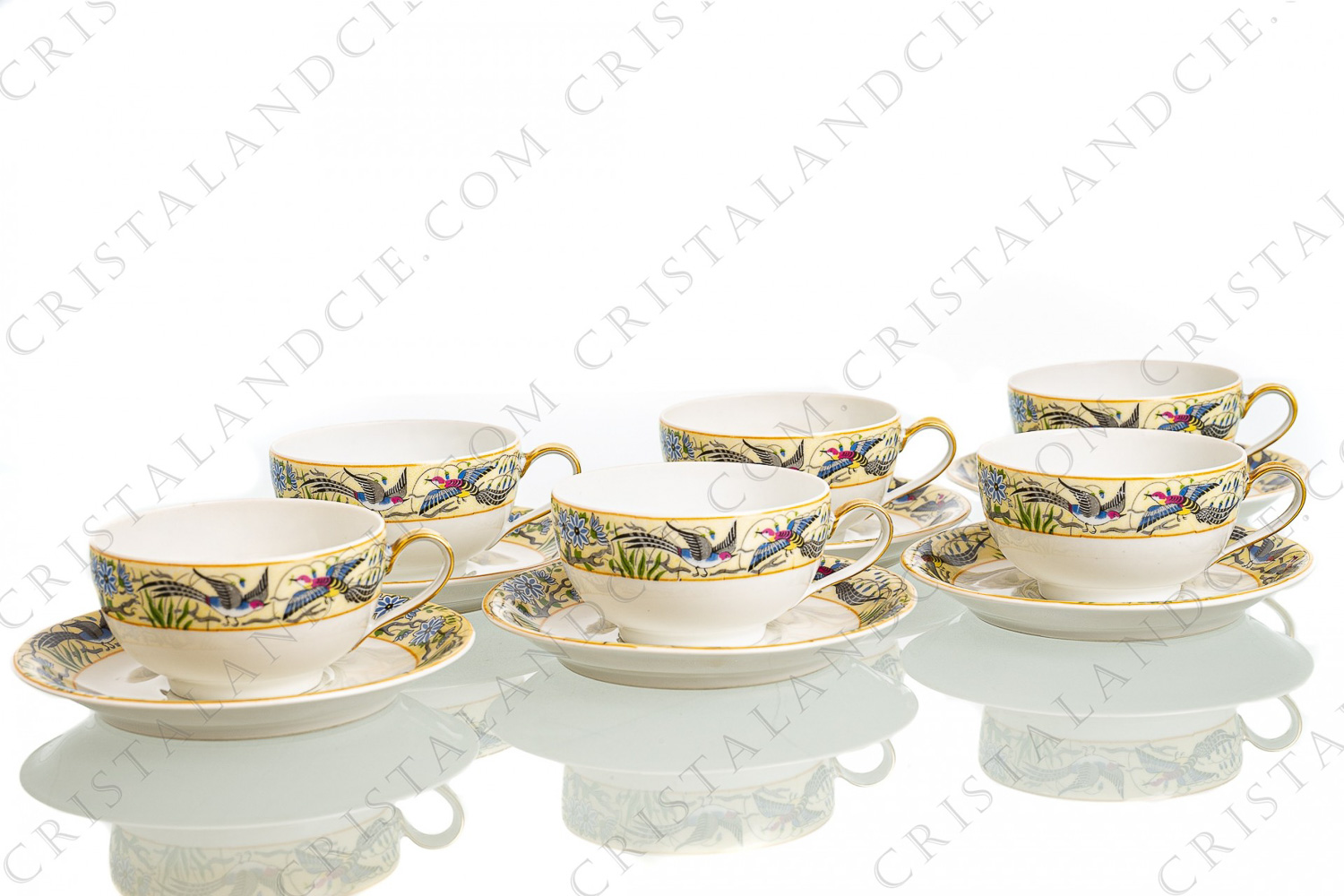 Set of six tea cups in Limoges china by William Guerin and Cie decorated with a polychrome frieze of flowers and birds of paradise photo-1