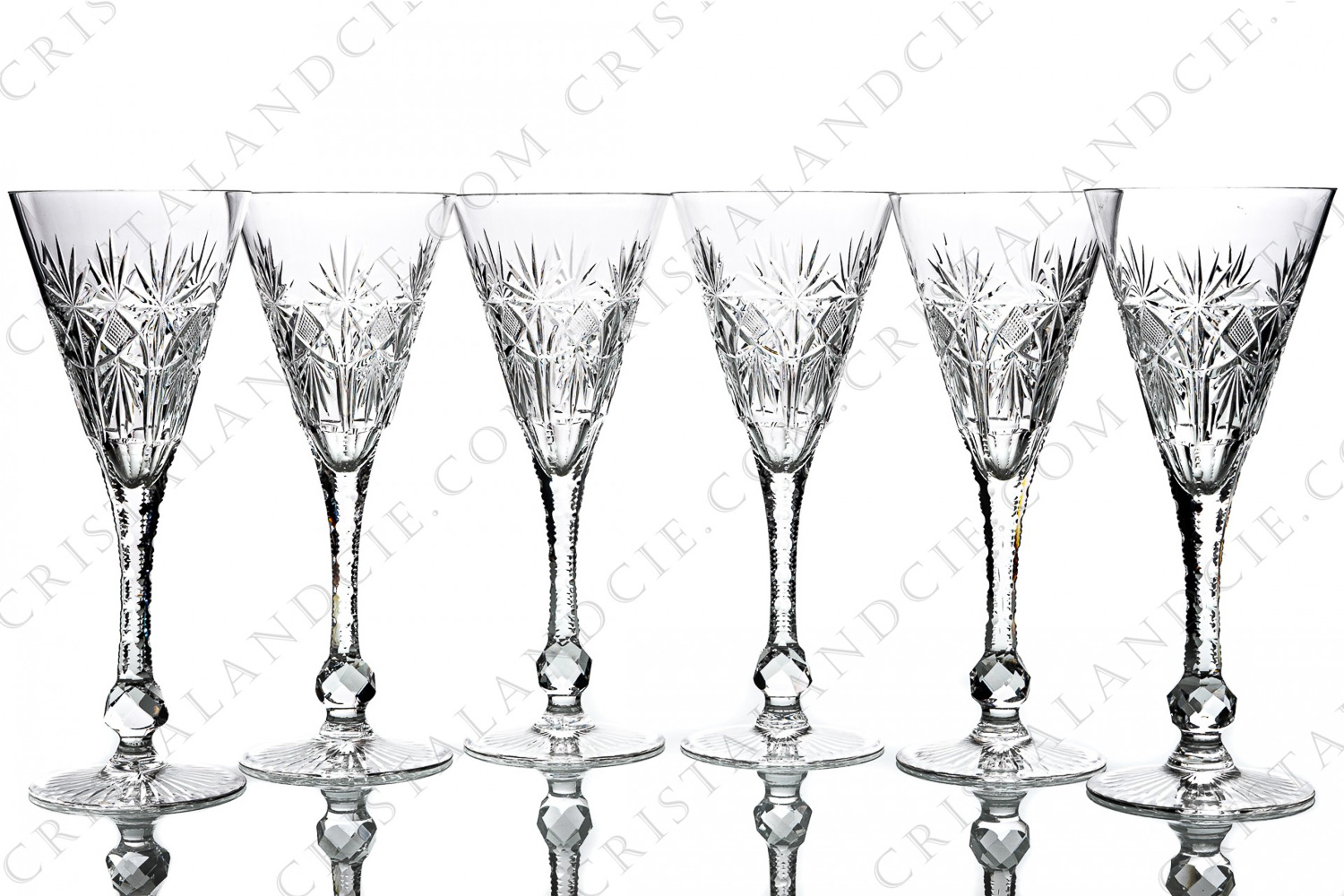 Set of six Champagne glasses in crystal by Saint-Louis pattern Cosmos cut 7113 with an important cut patten on the gob, an engraved stem with a faceted ring and a star under the foot photo-1
