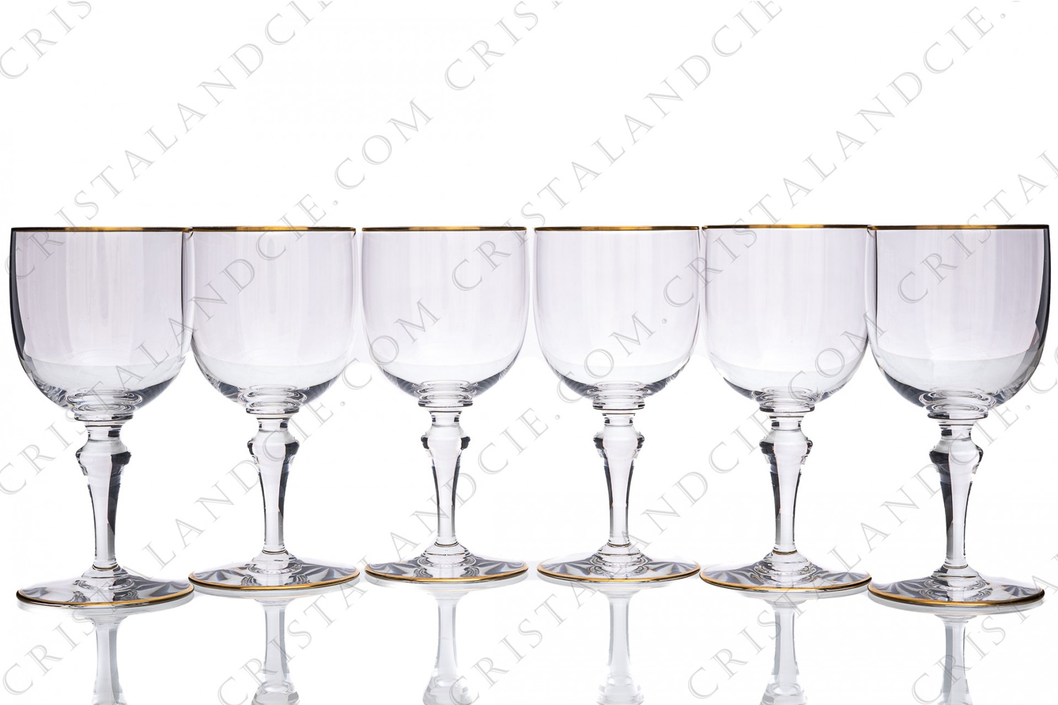 Set of six water glasses n°2 in crystal by Baccarat pattern Mahora decorated with gold borders photo-1