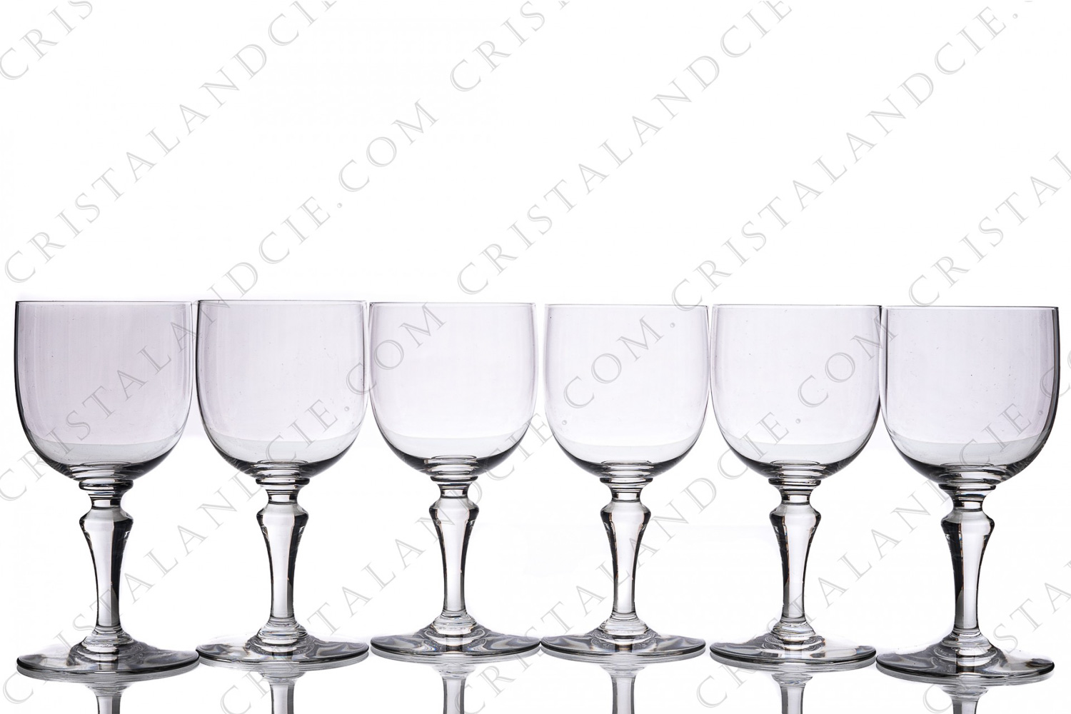 Série de six verres à eau n°2 en cristal de Baccarat modèle Normandie présentant une jambe balustre photo-1