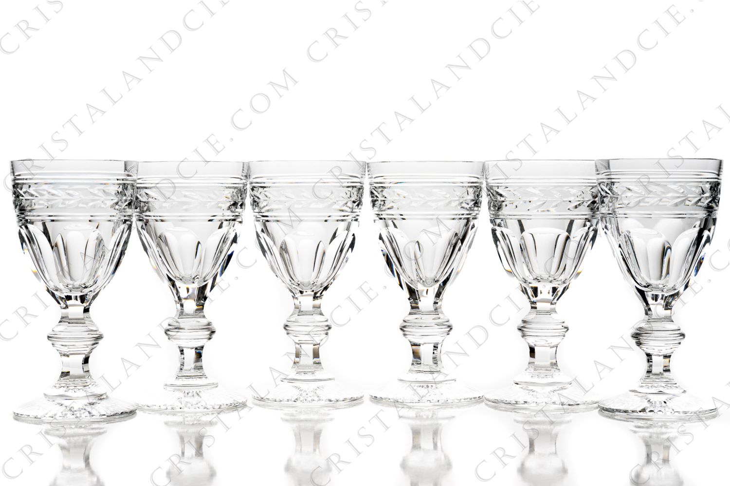 Set of six white wine glass n°4 in crystal by Baccarat pattern Jonzac decorated with flatcut and a frieze of laurels on the parison, the stem is decorated with a ring and the foot with a star photo-1