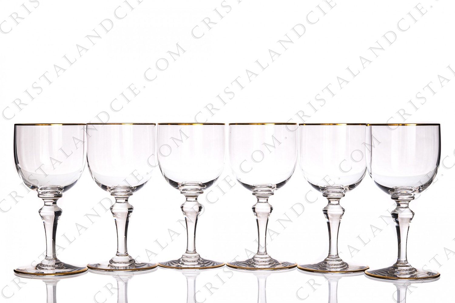 Set of six wine glasses n°3 in crystal by Baccarat pattern Mahora decorated with gold borders photo-1