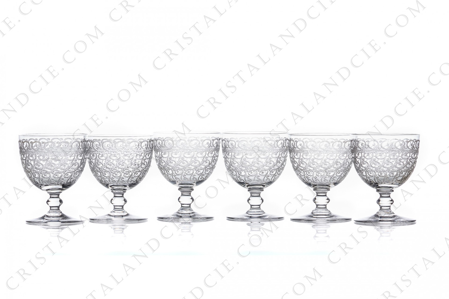 Set of six wine glasses n°4 in crystal by Baccarat pattern Rohan with an important engraved pattern and a ring on the stem photo-1
