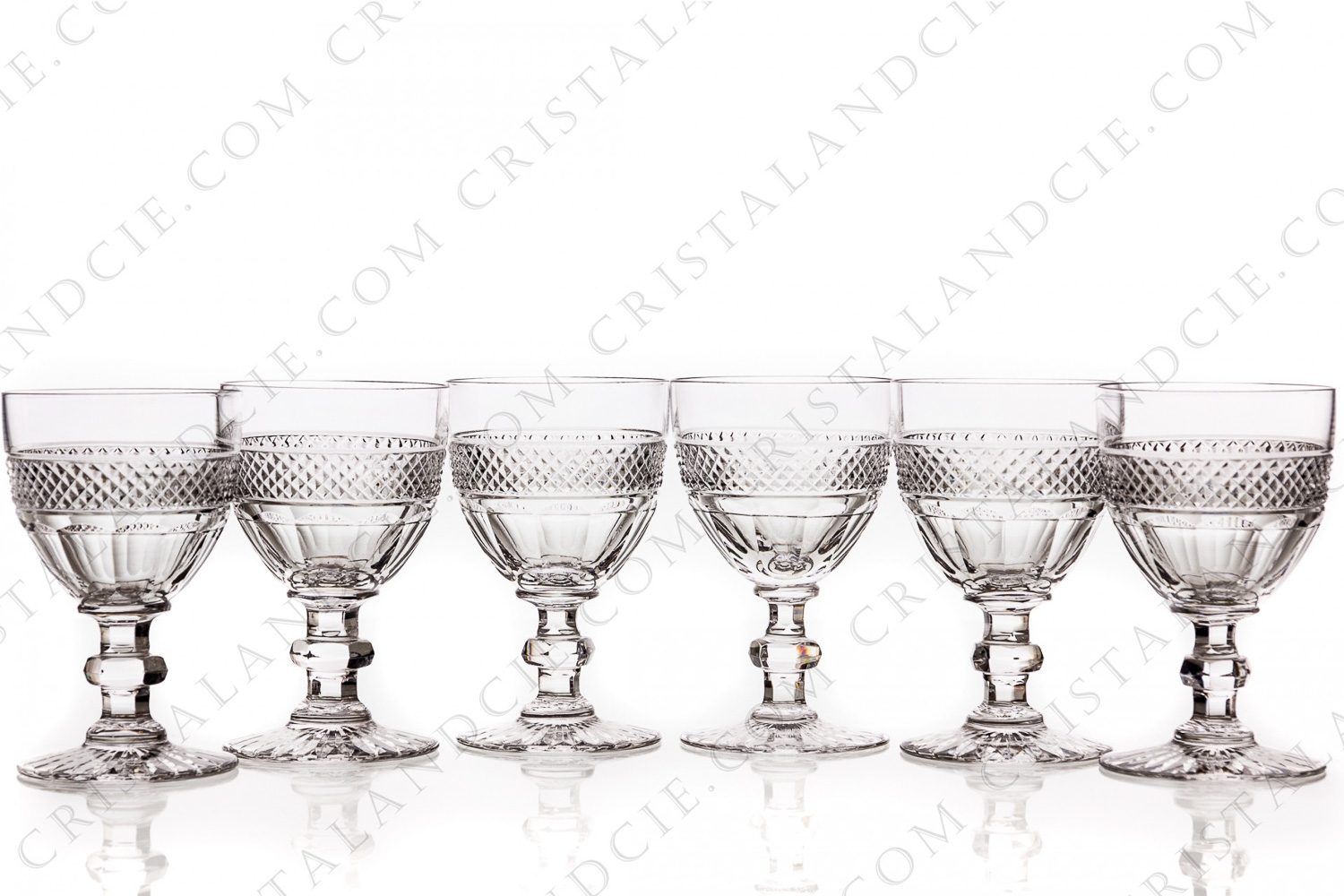 Set of six wine glasses n°3 in crystal by Saint-Louis pattern Trianonwith the parison is decorated with a Diamond tips frieze, stem with a ring photo-1
