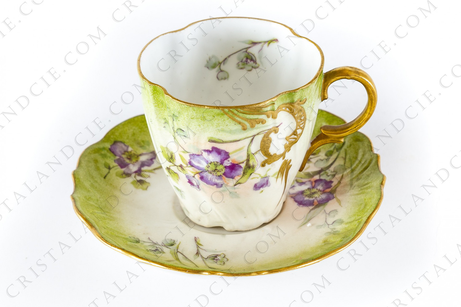 Coffee cup in china of Limoges with an hand painted pattern of wild roses and lilies of the valley photo-1