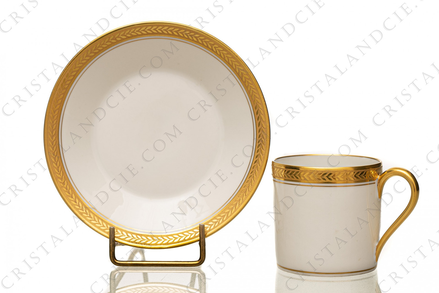 Coffee cup in china of Limoges decorated with a frieze of laurels in gold inlays, made by the Groupement des Fabricants de Porcelaines de Limoges for the Colonial Exhibition of 1931 photo-1
