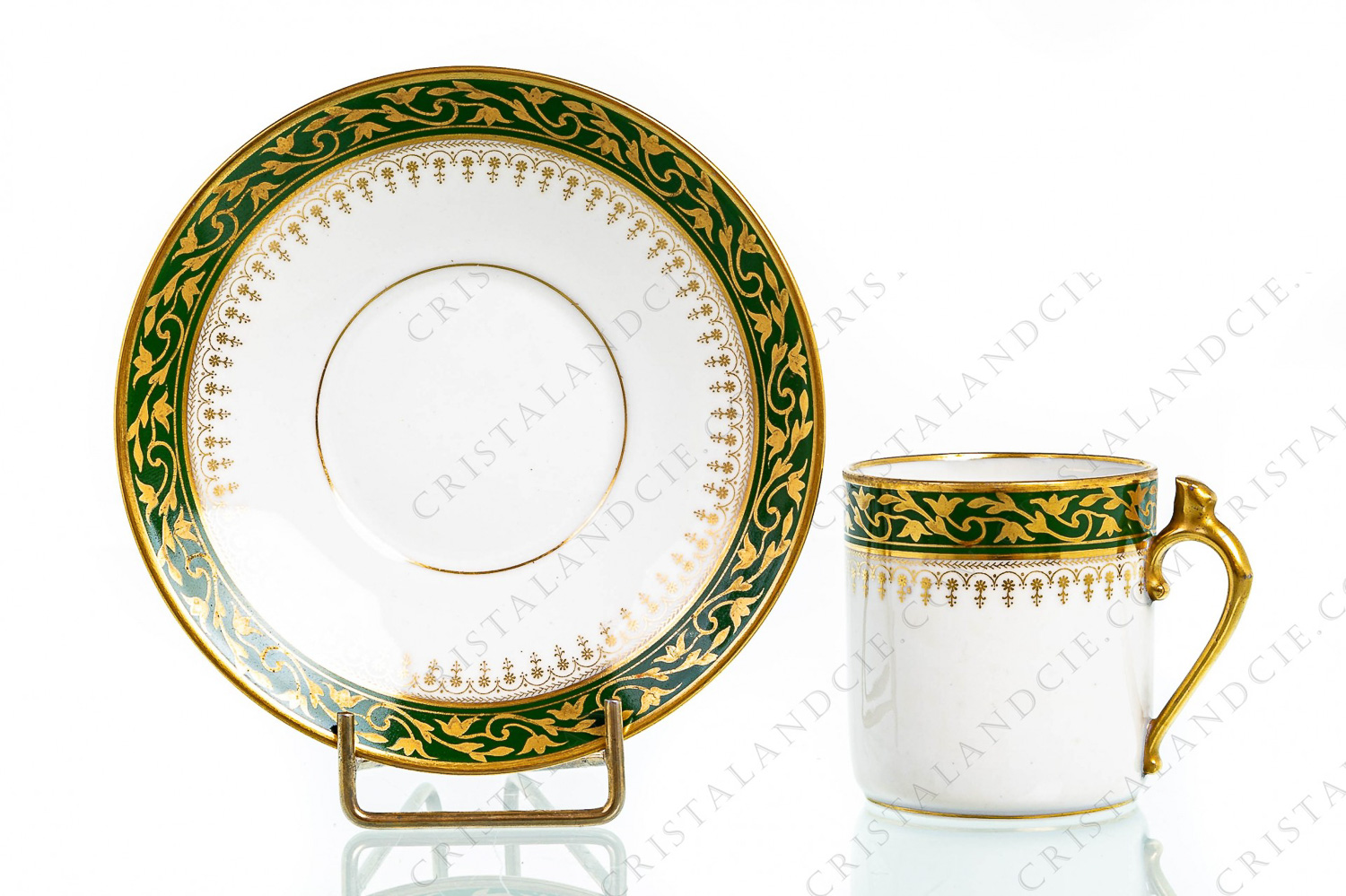Coffee cup in Limoges china by Chabrol and Poirier decorated with a gold frieze of plant arabesques on a green border photo-1