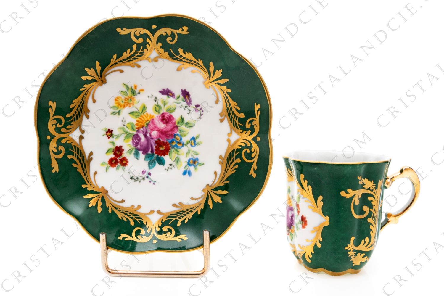 Coffee cup in china hand decorated by the workshops Le Tallec, decorated with hand painted polychrome flowers on a green background and gold arabesque photo-1