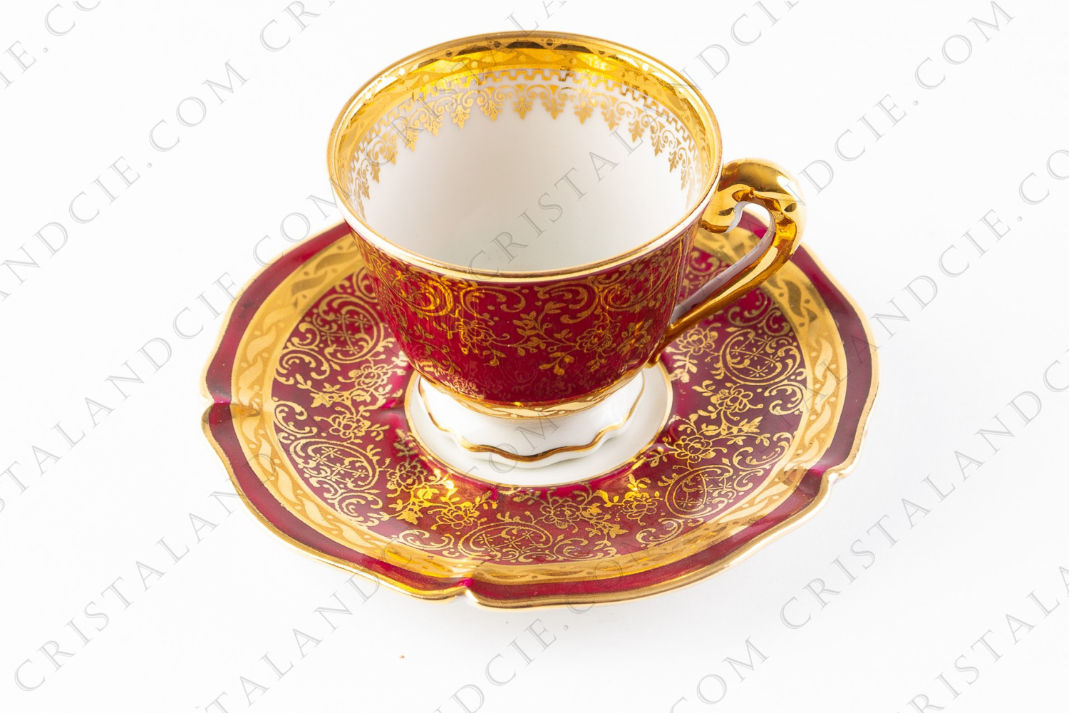 Moka cup in Limoges china by André, decorated with gold arabesques on a pink background photo-1