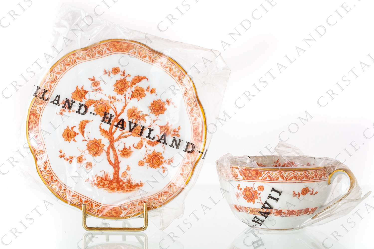 Tea cup in Limoges china by Haviland pattern Arbre corail shape Lutece decorated with a coral flowered tree in the middle, with vegetables friezes and with a gold border photo-1